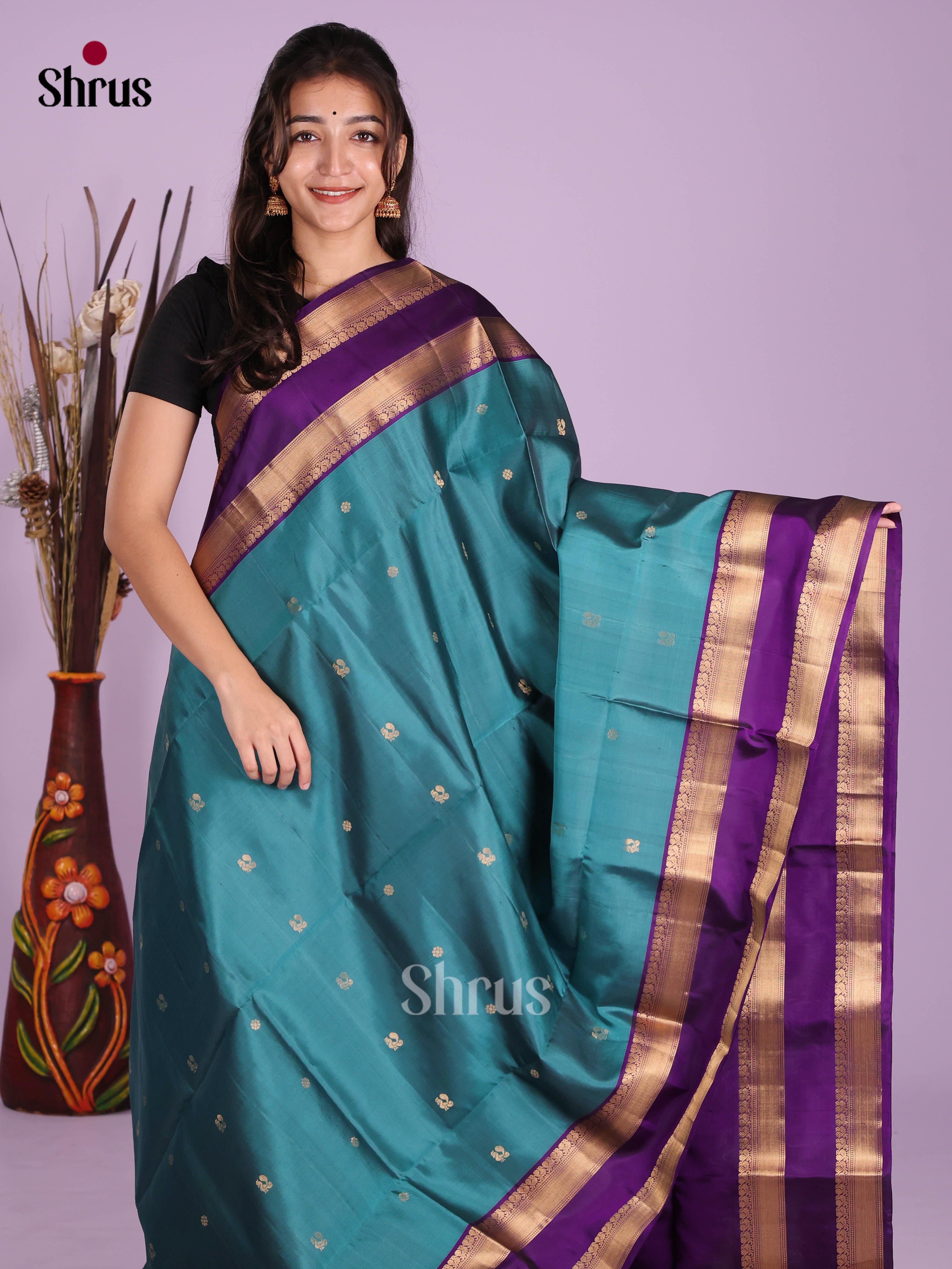 Blue & Violet Soft Silk Saree with peacock , floral buttas , rettaipet border