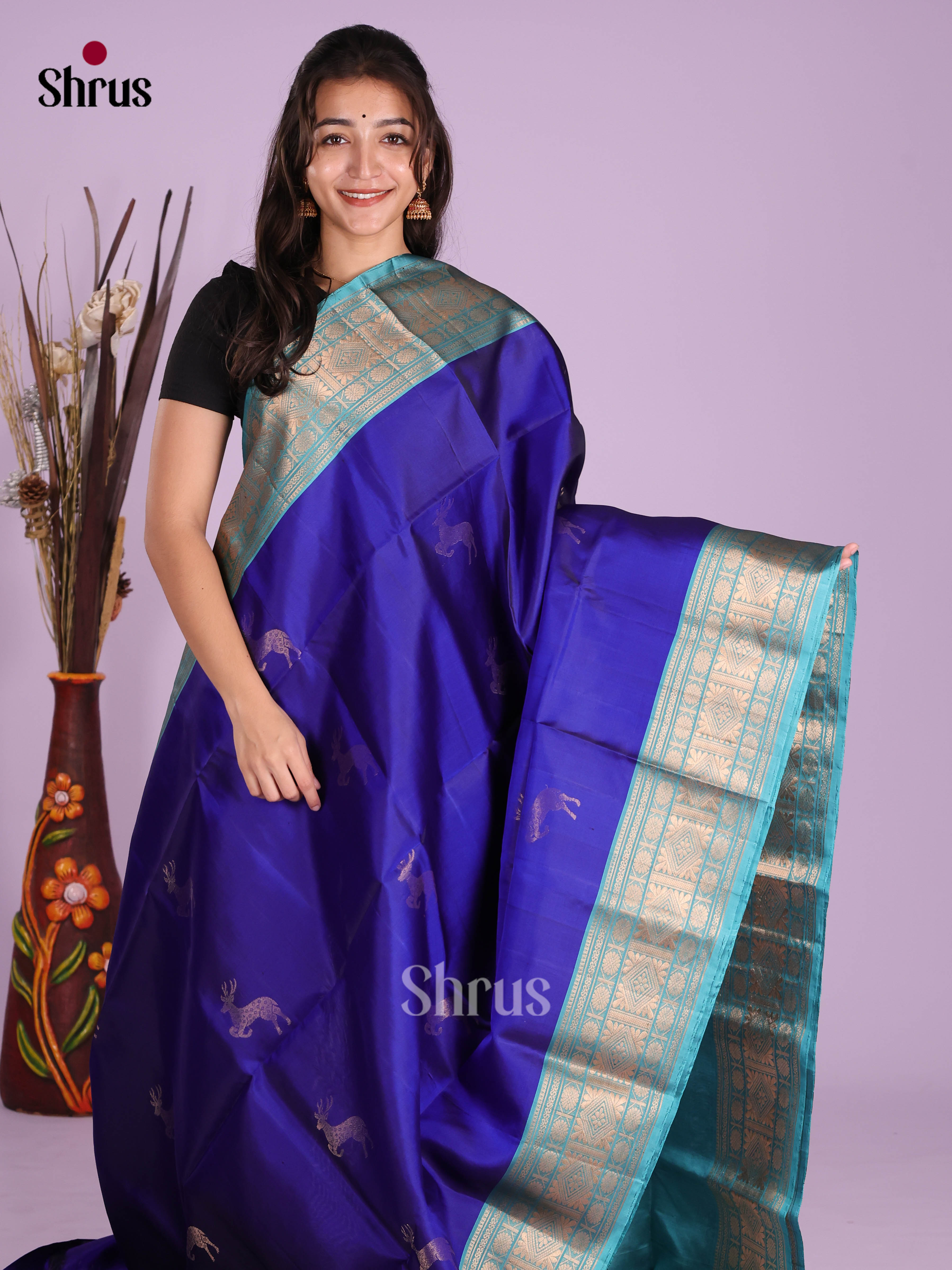 Royal Blue & Light Blue Soft Silk Saree gleams with gold zari deer motifs