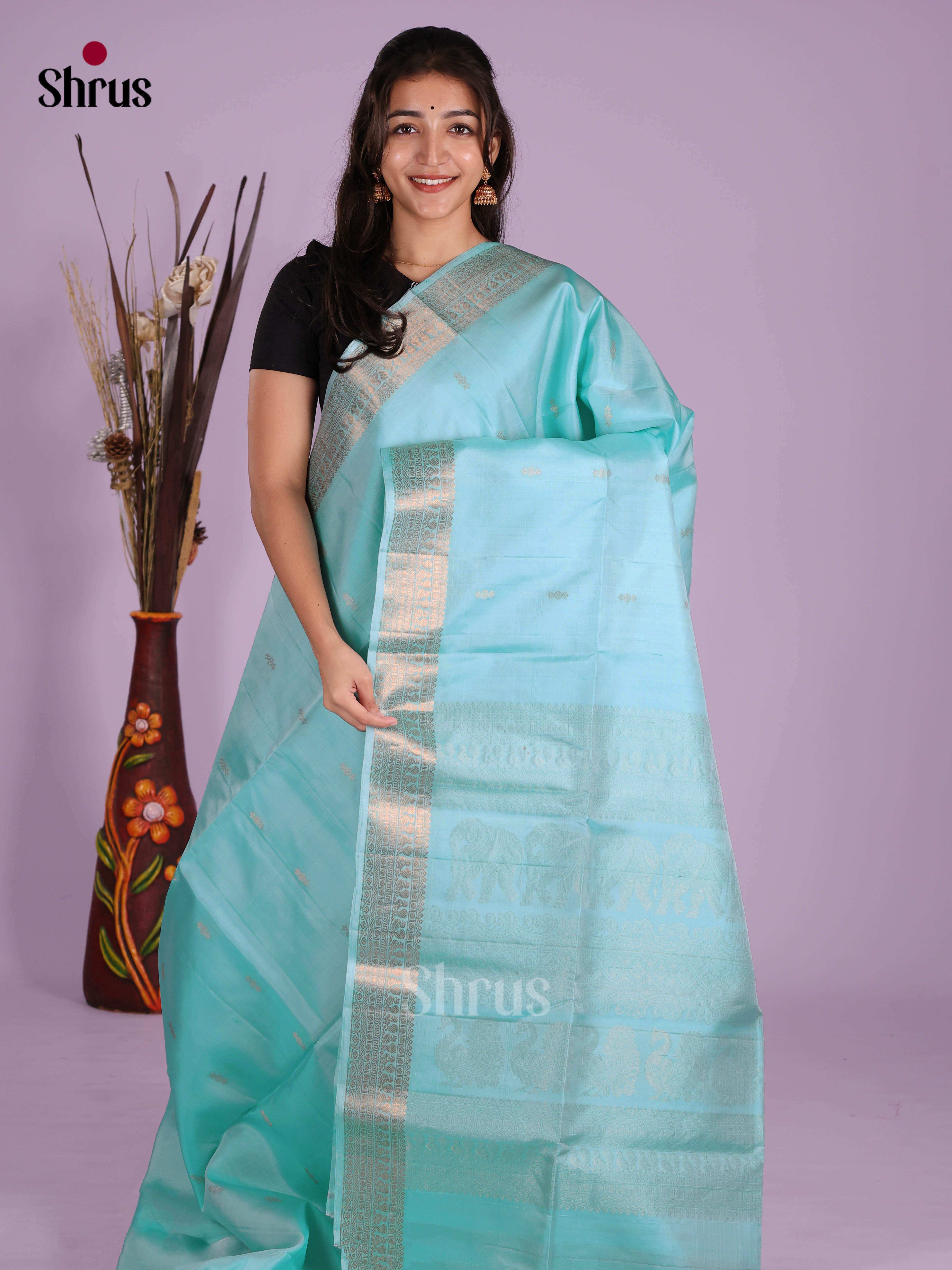 Charming pastel blue single tone Soft Silk Saree with peacock , elephant motifs in the pallu