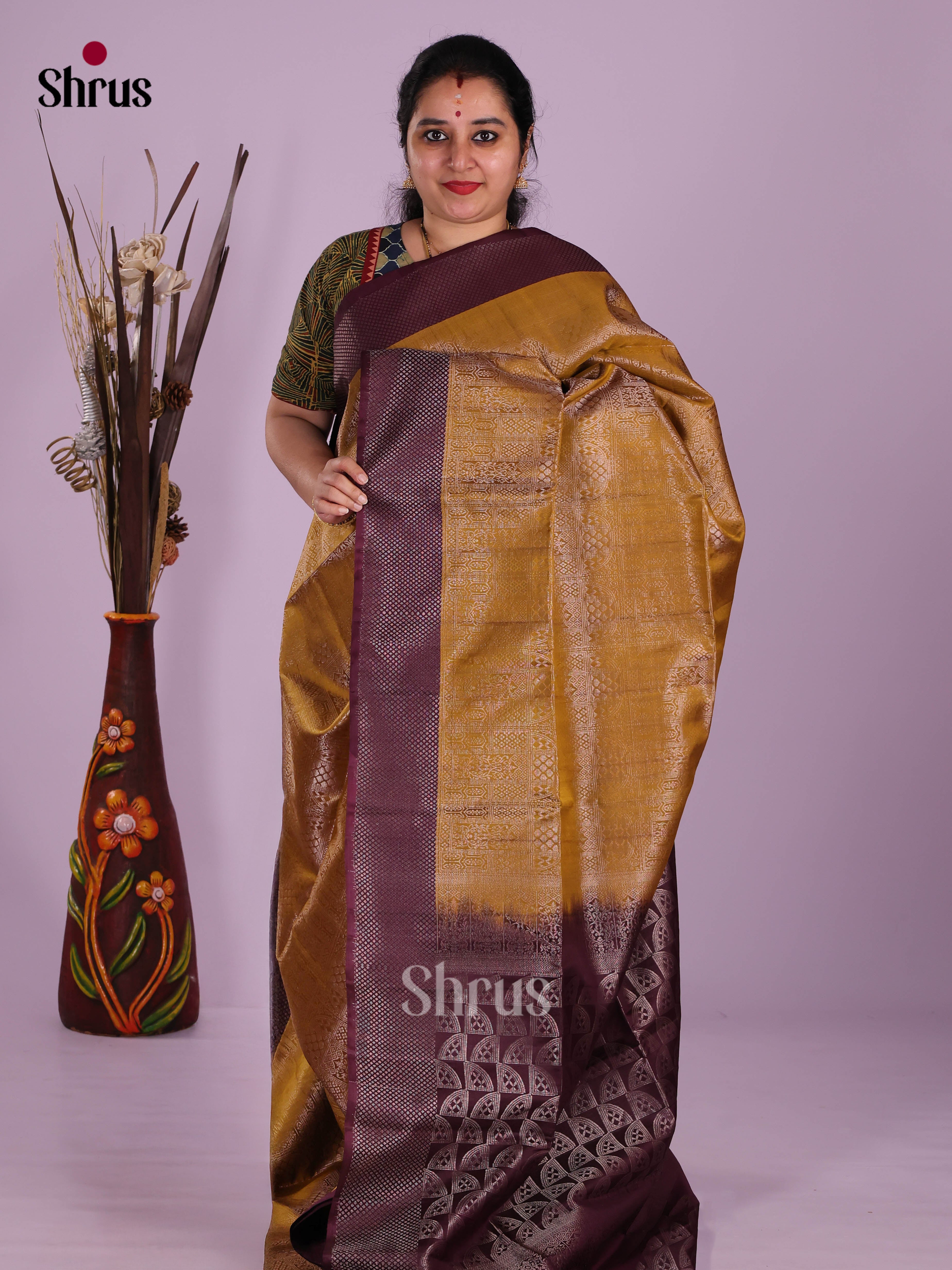 Glorious Dark Mustard Soft Silk Saree with brocade body & purple border