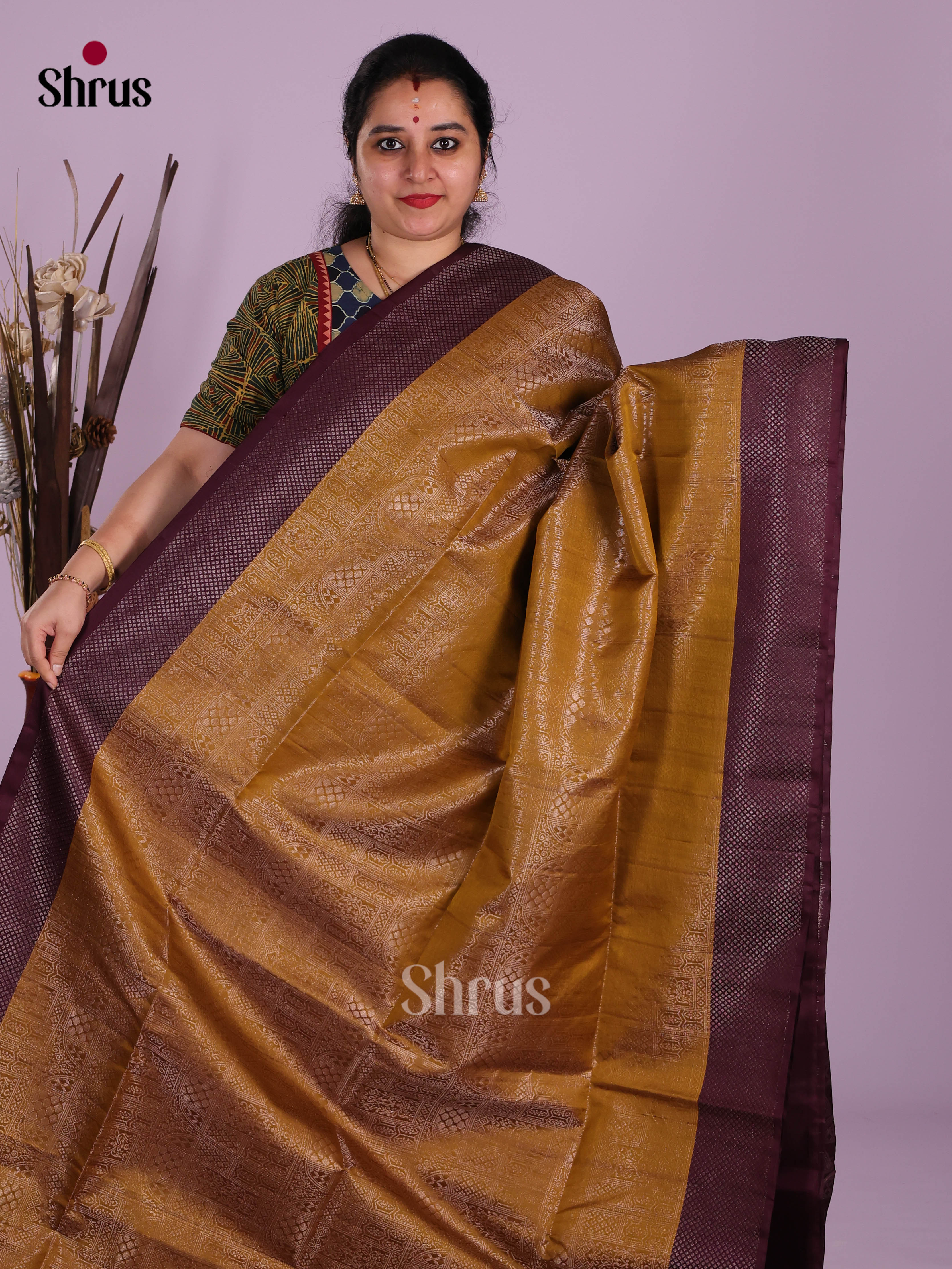 Glorious Dark Mustard Soft Silk Saree with brocade body & purple border