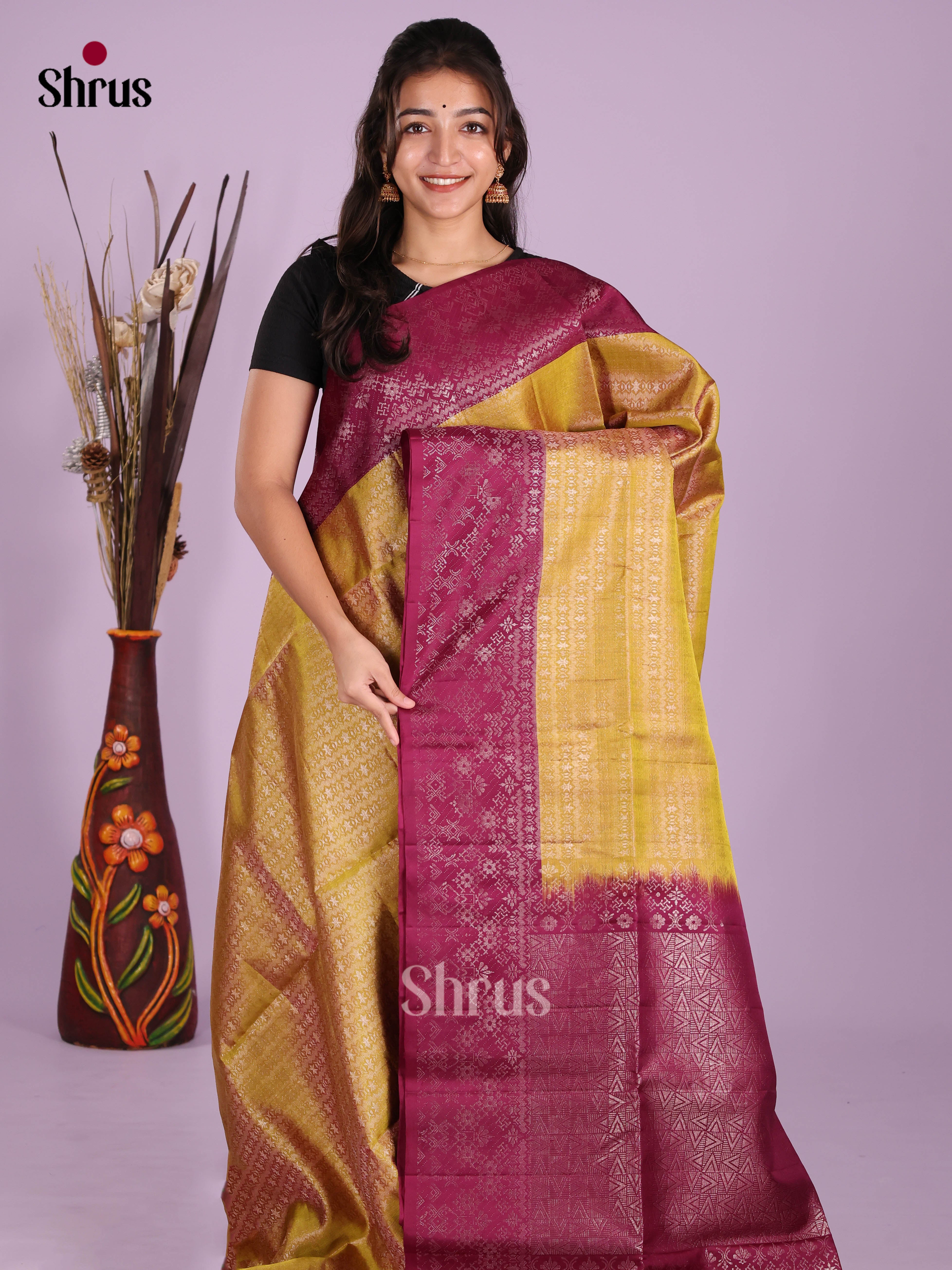 Glorious Mustardy Green Soft Silk Saree gleams with zari woven floral nestling brocade - Shop on Shrus.com