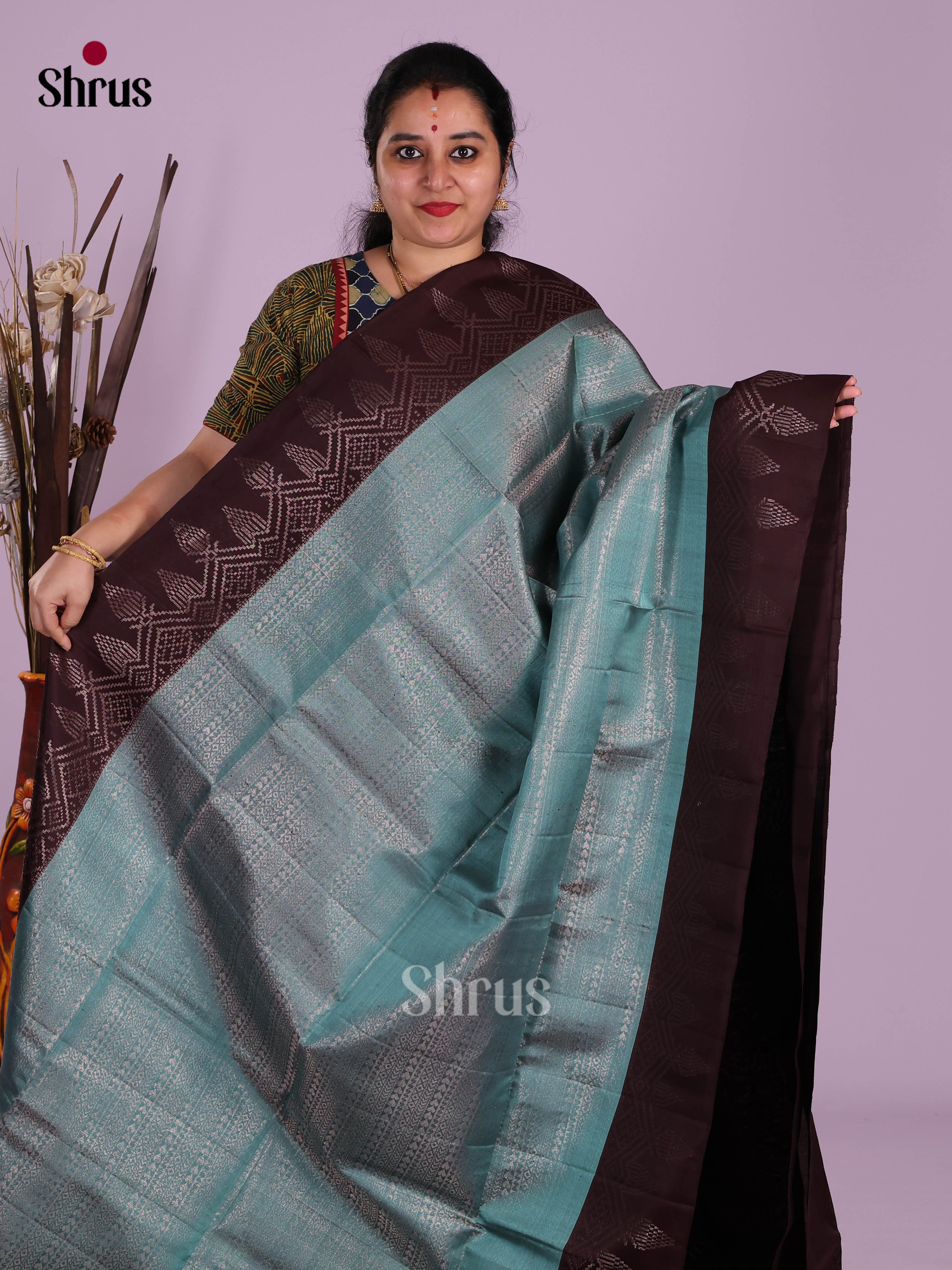 Vibrant Teal Blue Soft Silk Saree with zari brocade body & brown border
