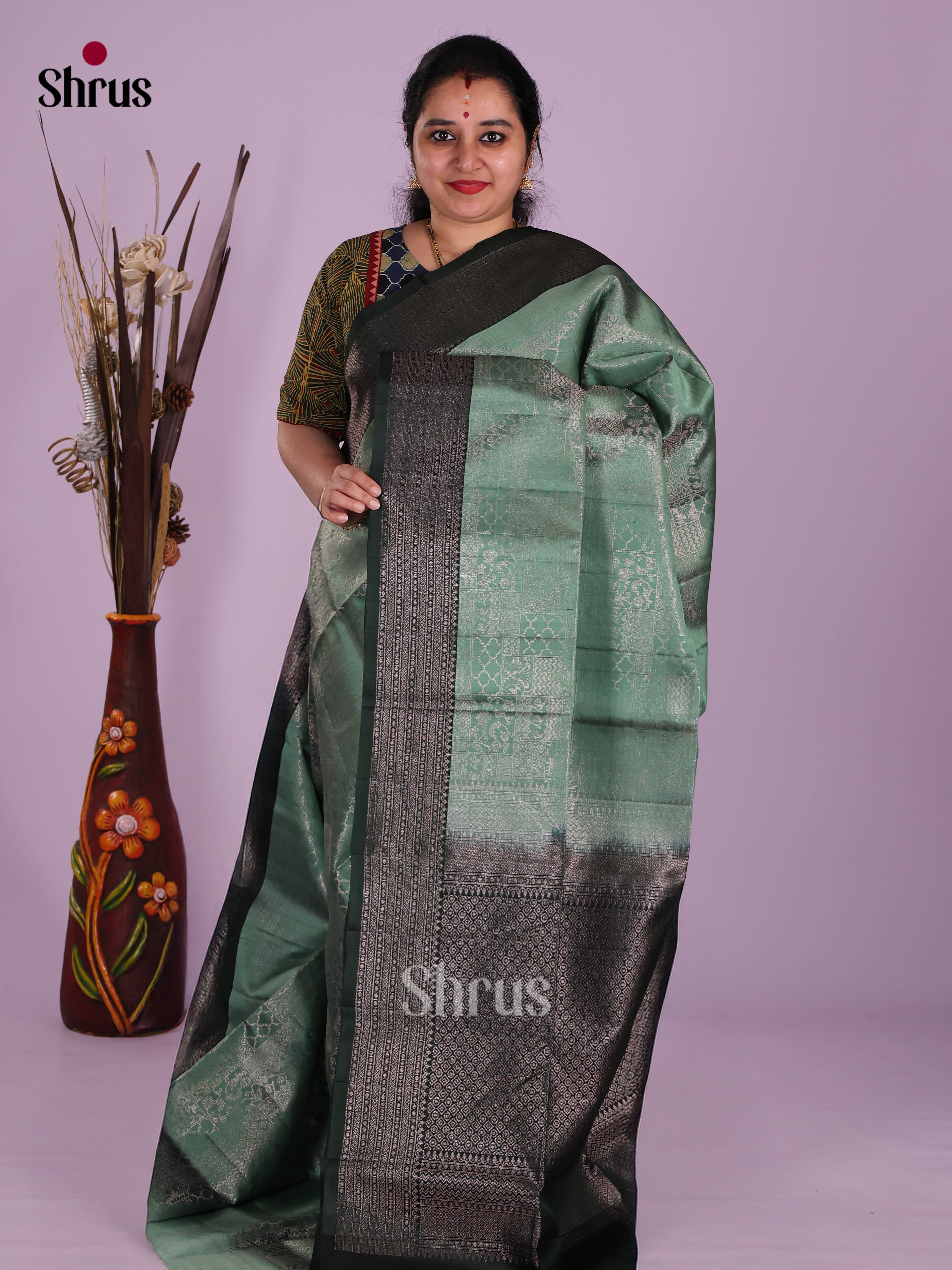 Pretty Aqua green Soft Silk Saree With Zari Floral Brocade & Dark Green border