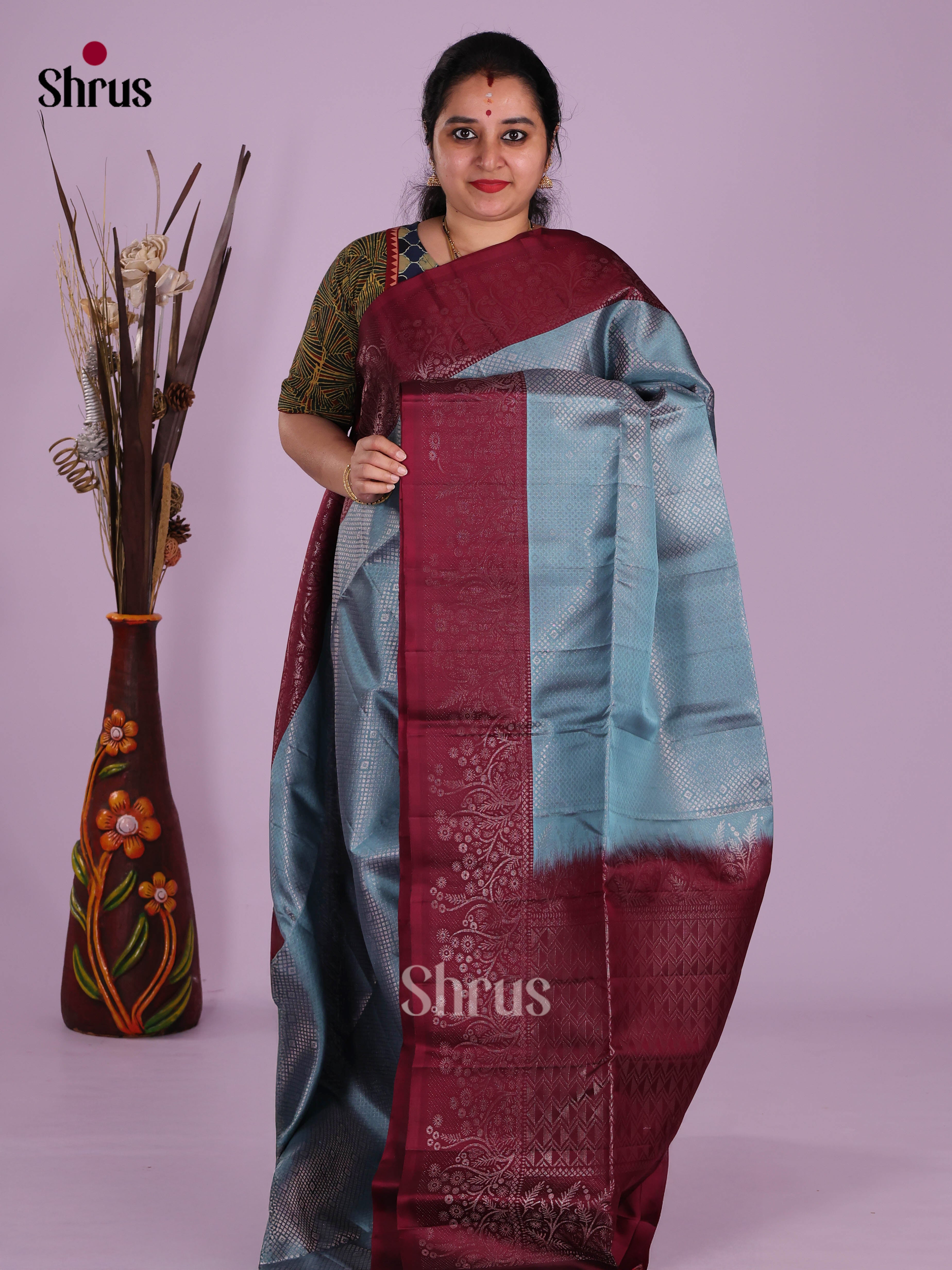 Elegant Blue & Maroon Soft Silk Saree with zari brocade & floral nestling border
