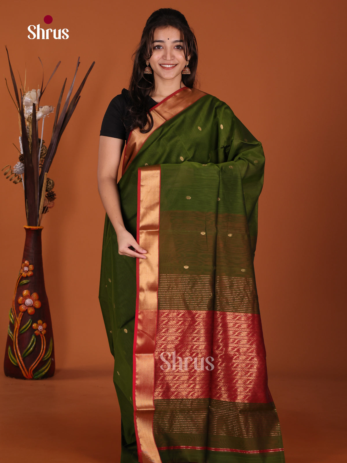 Ethereal Green & Red Maheshwari silkcotton Saree with zari buttas
