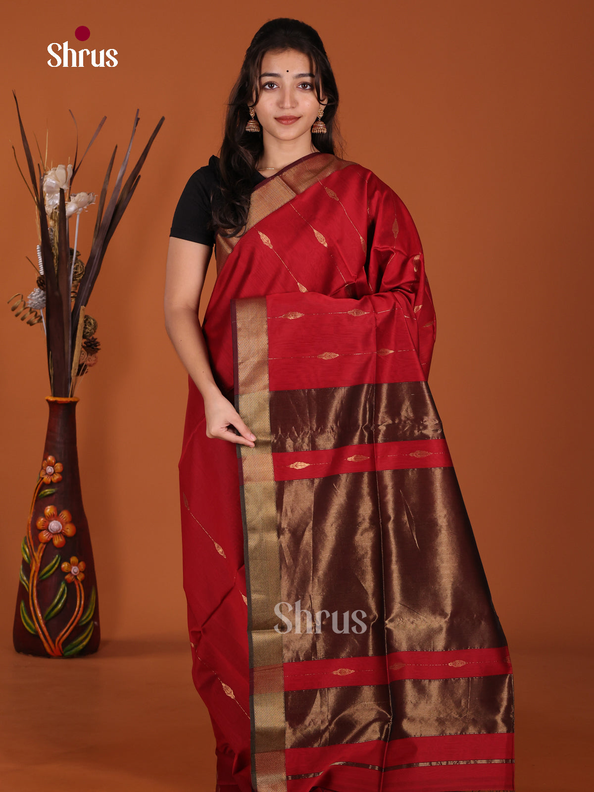 Bright Red & Maroon Maheshwari silkcotton Saree gleams with zari buttas