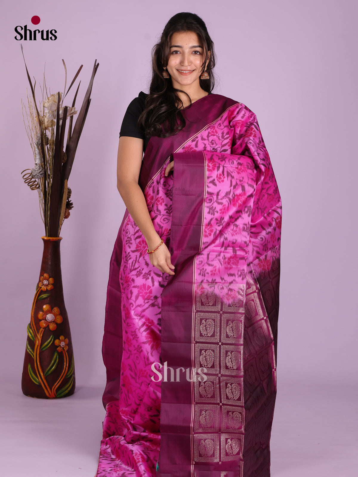 Beautiful Pink Soft Silk Saree with ikat floral pattern & peacock buttas pallu
