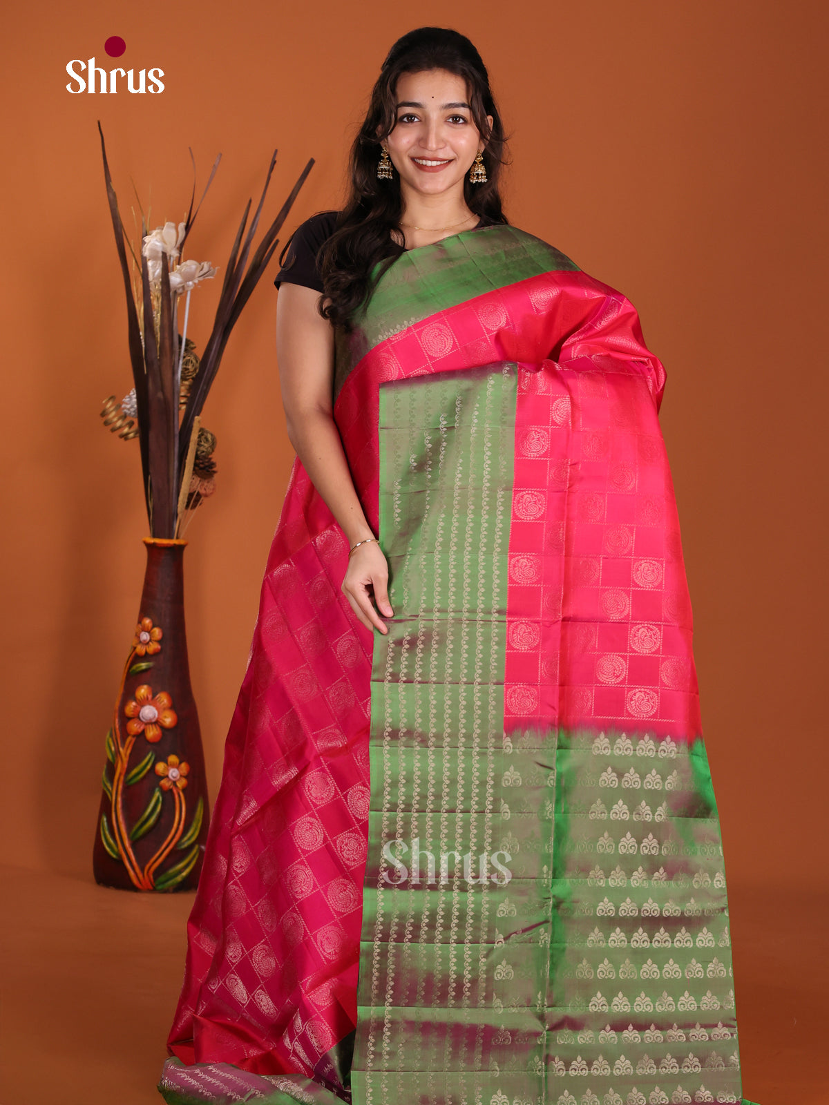 Charming Pink & Green Soft Silk Saree with zari Checks & peacock motifs