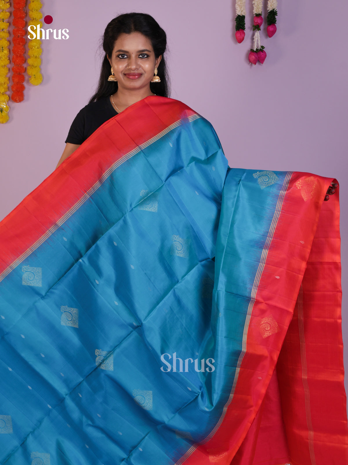 Chic & Elegant Blue & Oragish Pink Soft Silk Saree with zari floral buttas & brocade pallu - Shop on Shrus.com