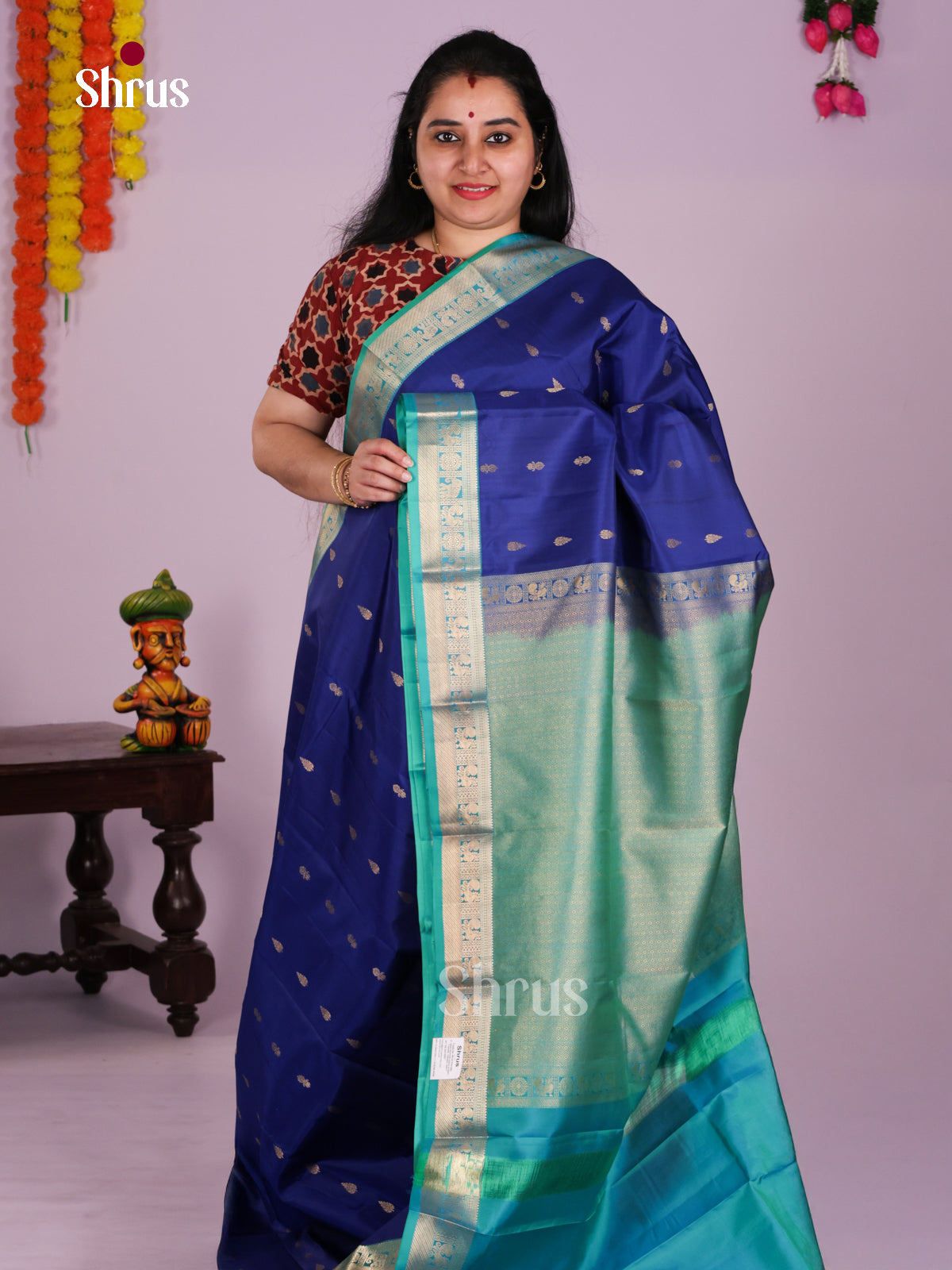 Stunning Royal Blue Kanchipuram Silk Saree With Zari Buttas & Sea Green Border