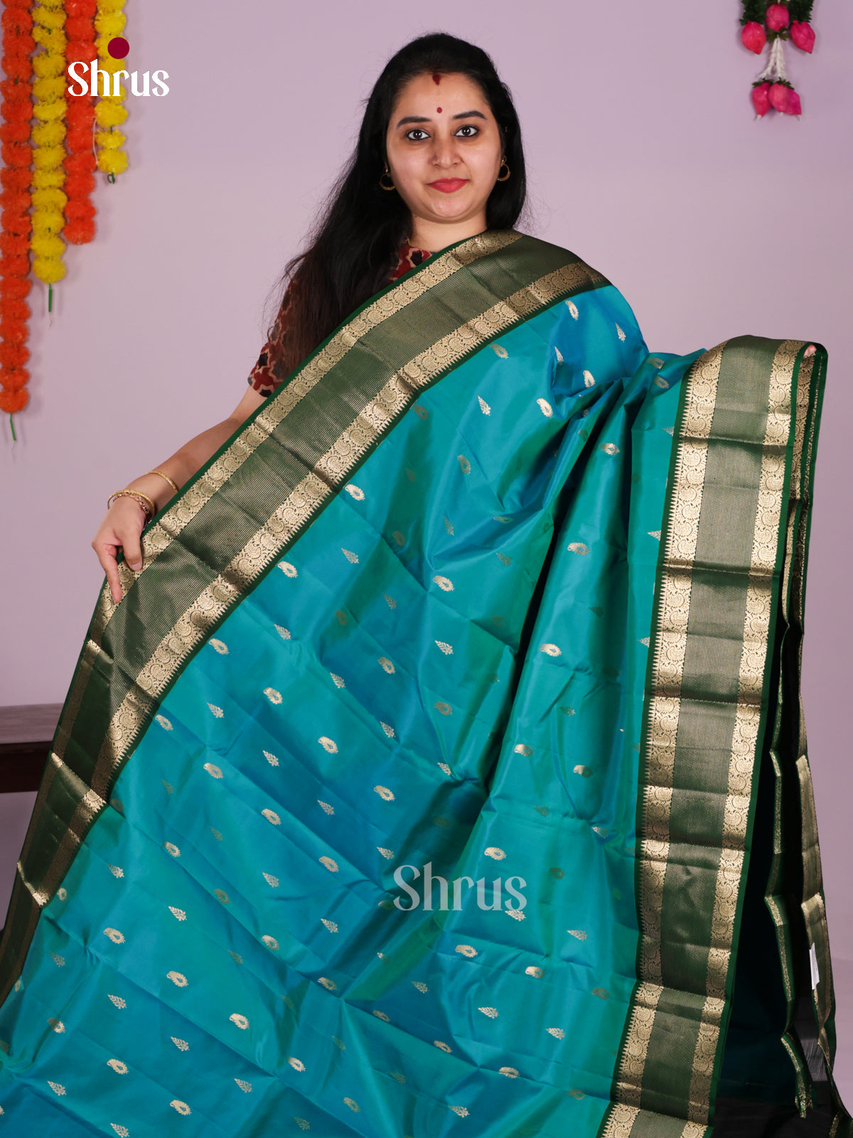 Turquoise Kanjivaram Saree With Green Rettaipet Zari Border