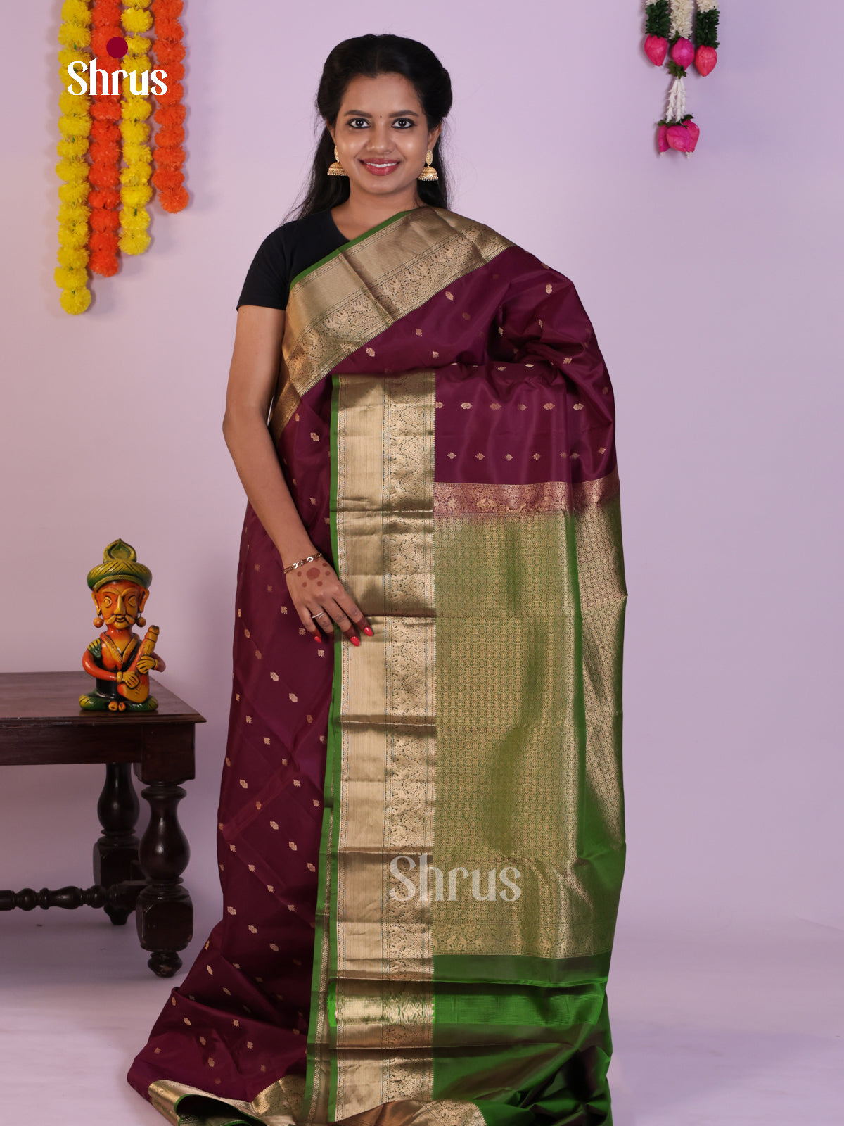 Classy Wine Kanjivaram Saree With Golden Buttas & Green Zari Border
