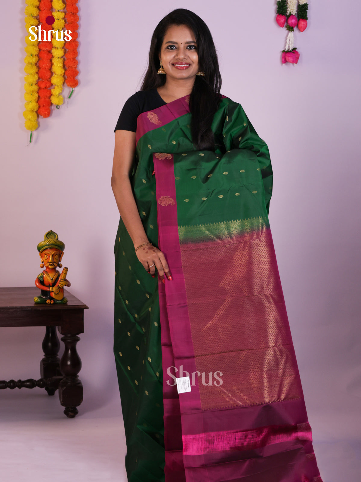 Dark Green Kanjivaram Silk Saree With Gold Buttas & Purple Brocade Pallu