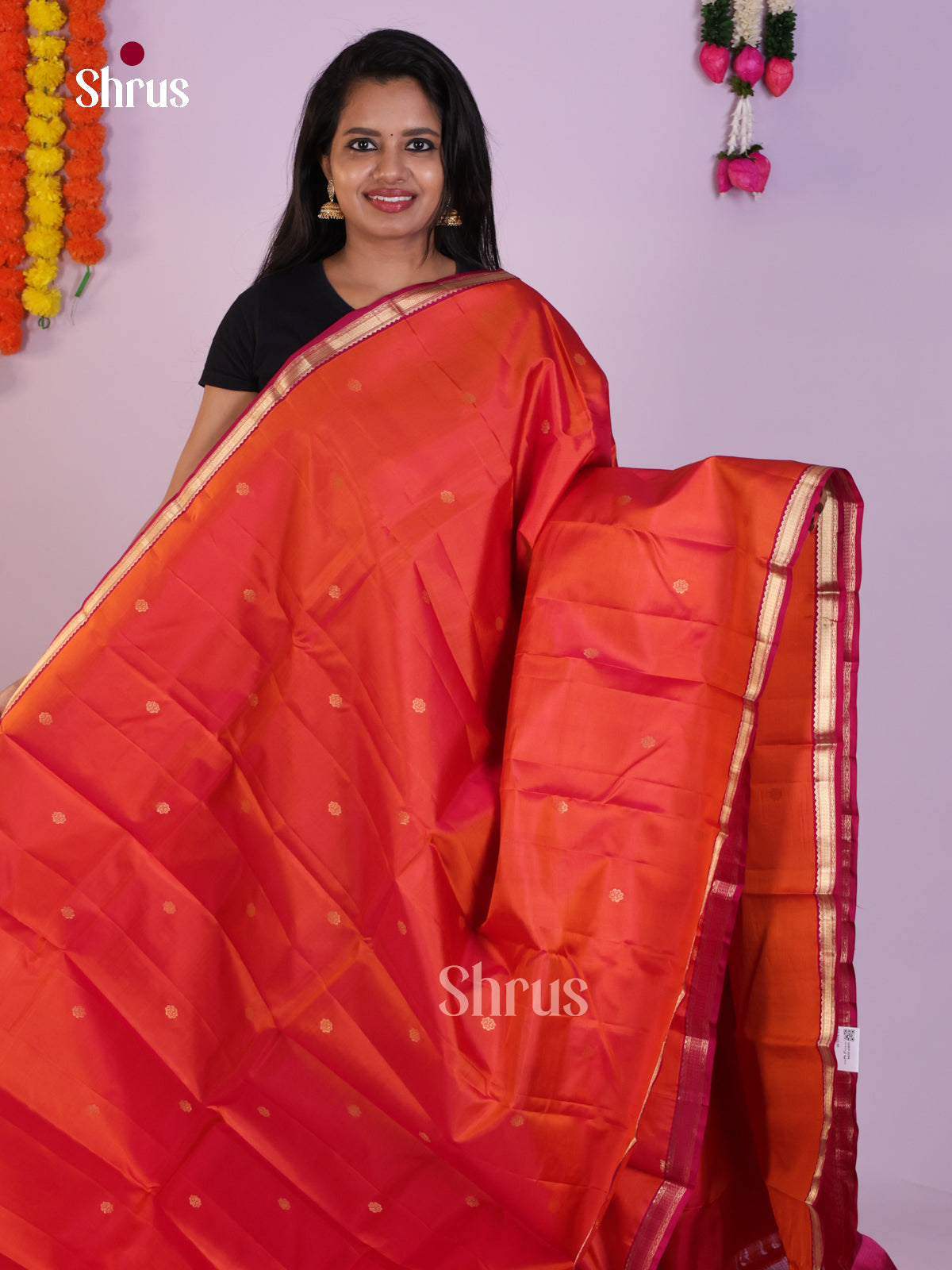 Radiant Orange Kanjivaram Saree With floral Buttas & Pink Small Border