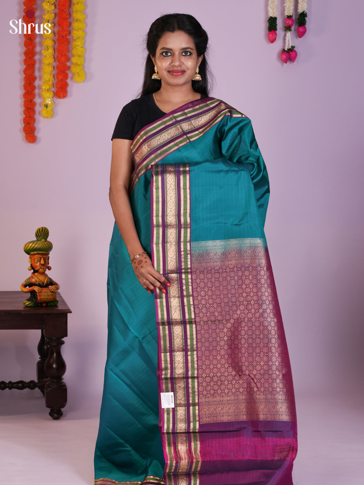 Enchanting Teal Kanchipuram Pattu Saree With Deep Purple Rettaipet Zari Border