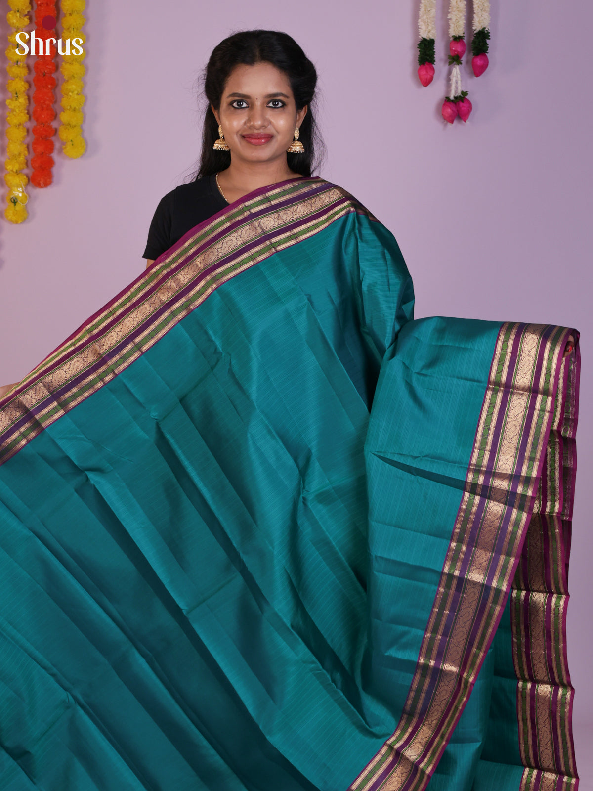 Enchanting Teal Pattu Saree With Deep Purple Rettaipet Zari Border