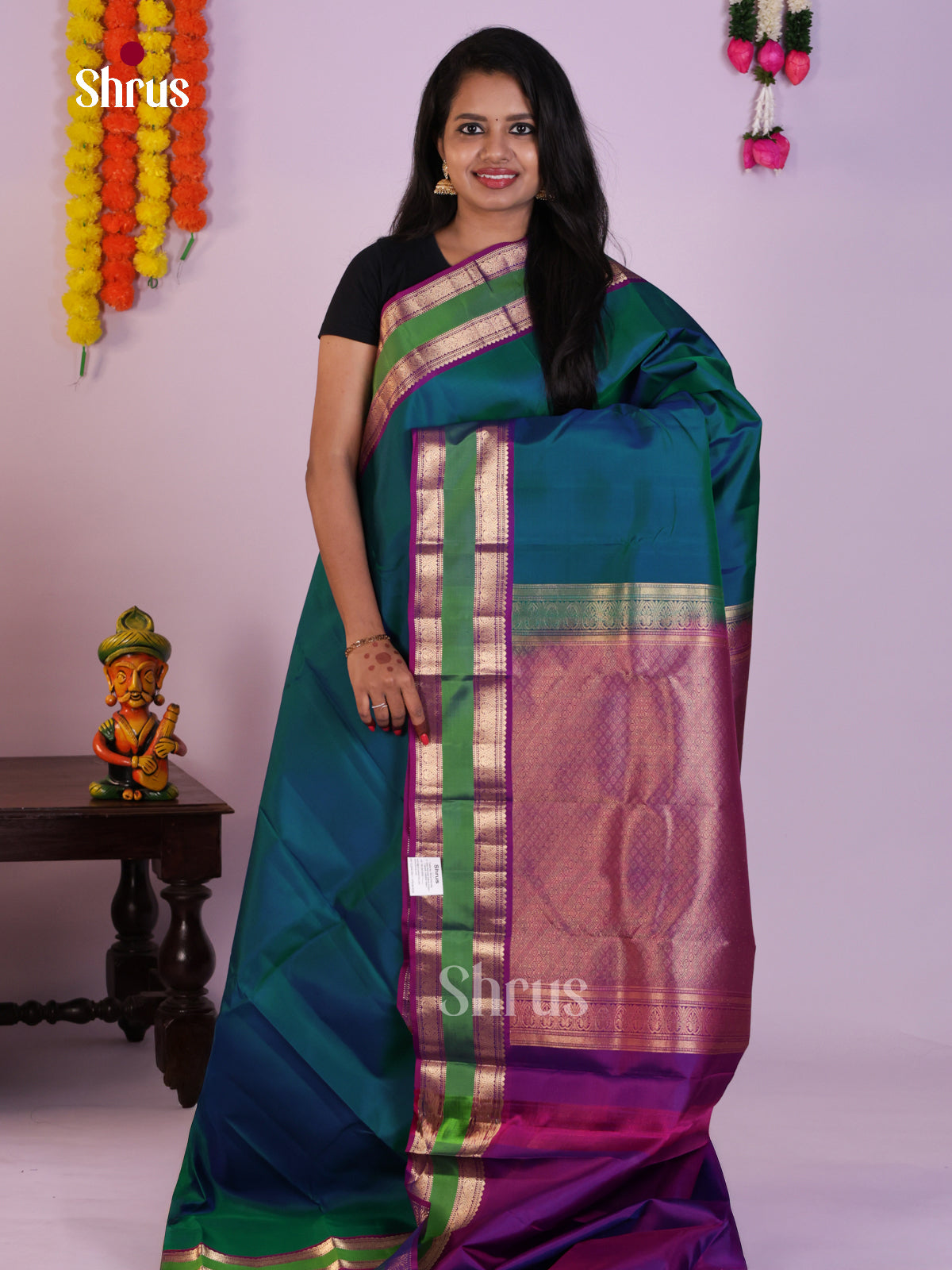 Bluish Green Kanchipuram Silk Saree with Rettaipet Zari Border