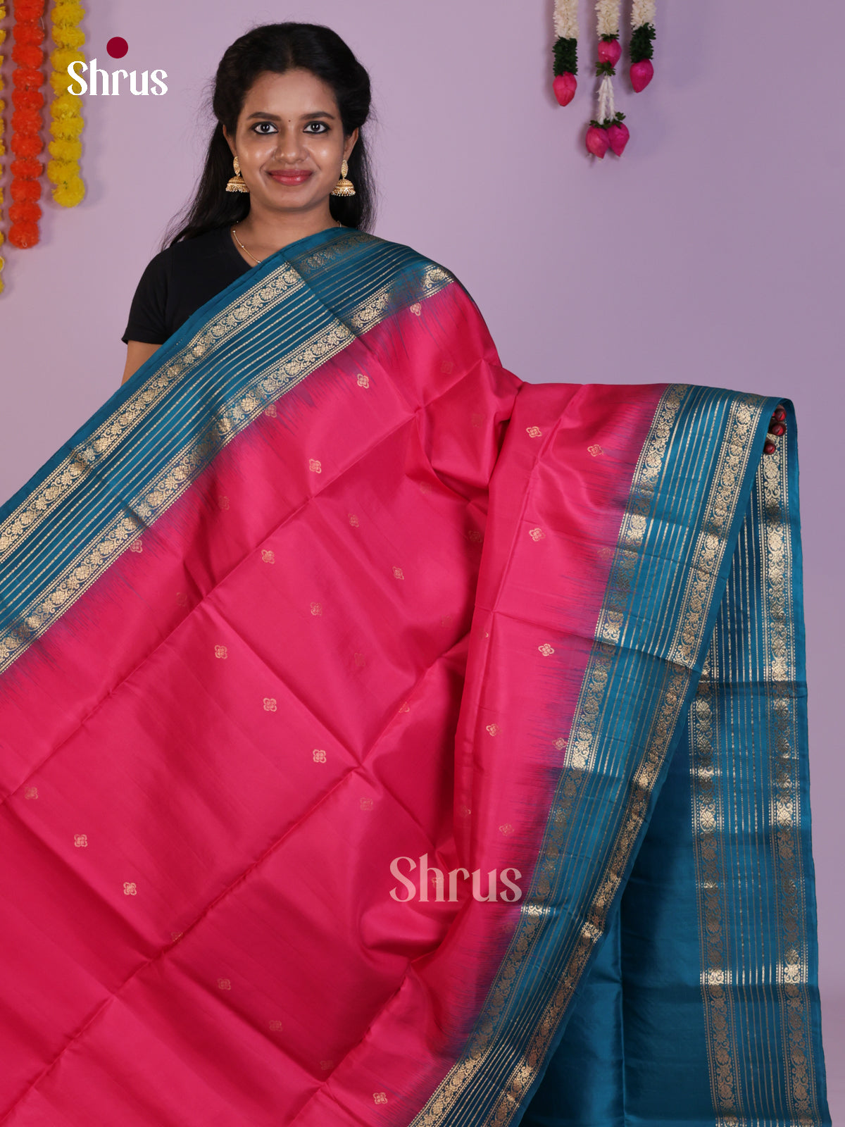 Elegant Pink & Blue Soft Silk Saree gleams with zari buttas & brocade pallu