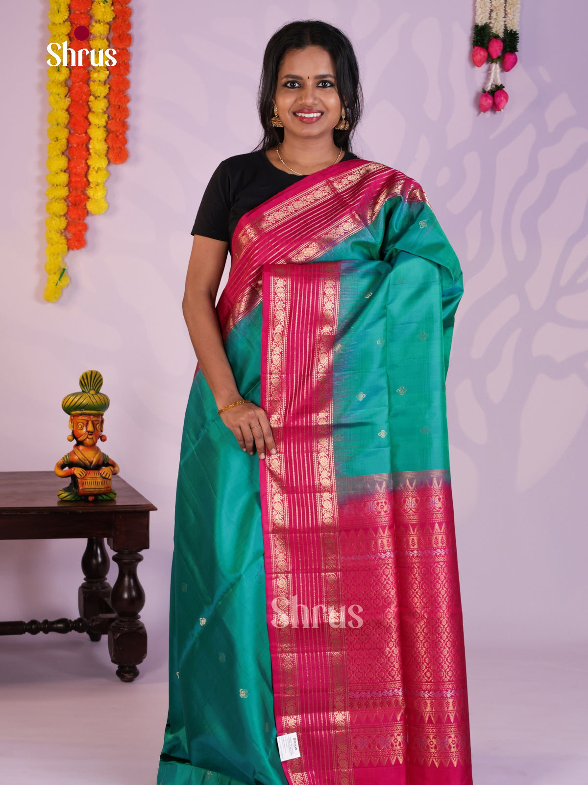 Gorgeous Green & Pink Soft Silk Saree with zari buttas & splendid border