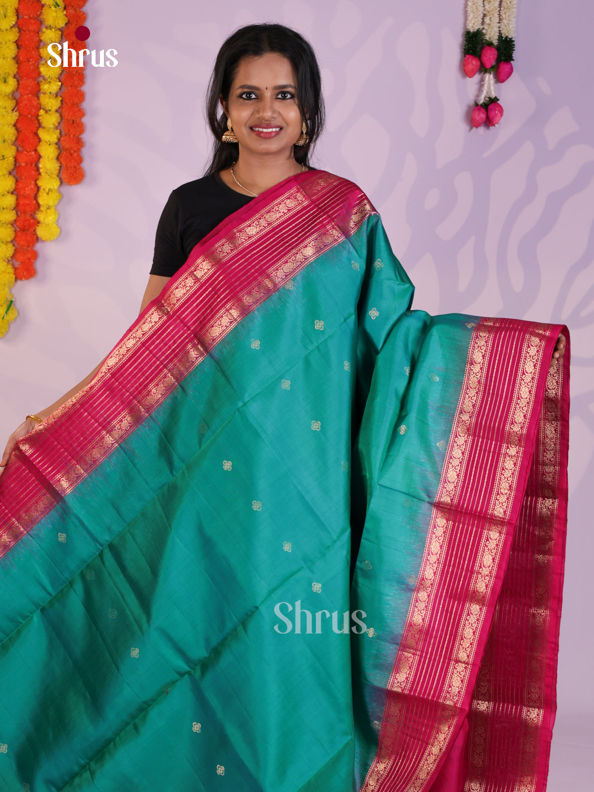 Gorgeous Green & Pink Soft Silk Saree with zari buttas & splendid border