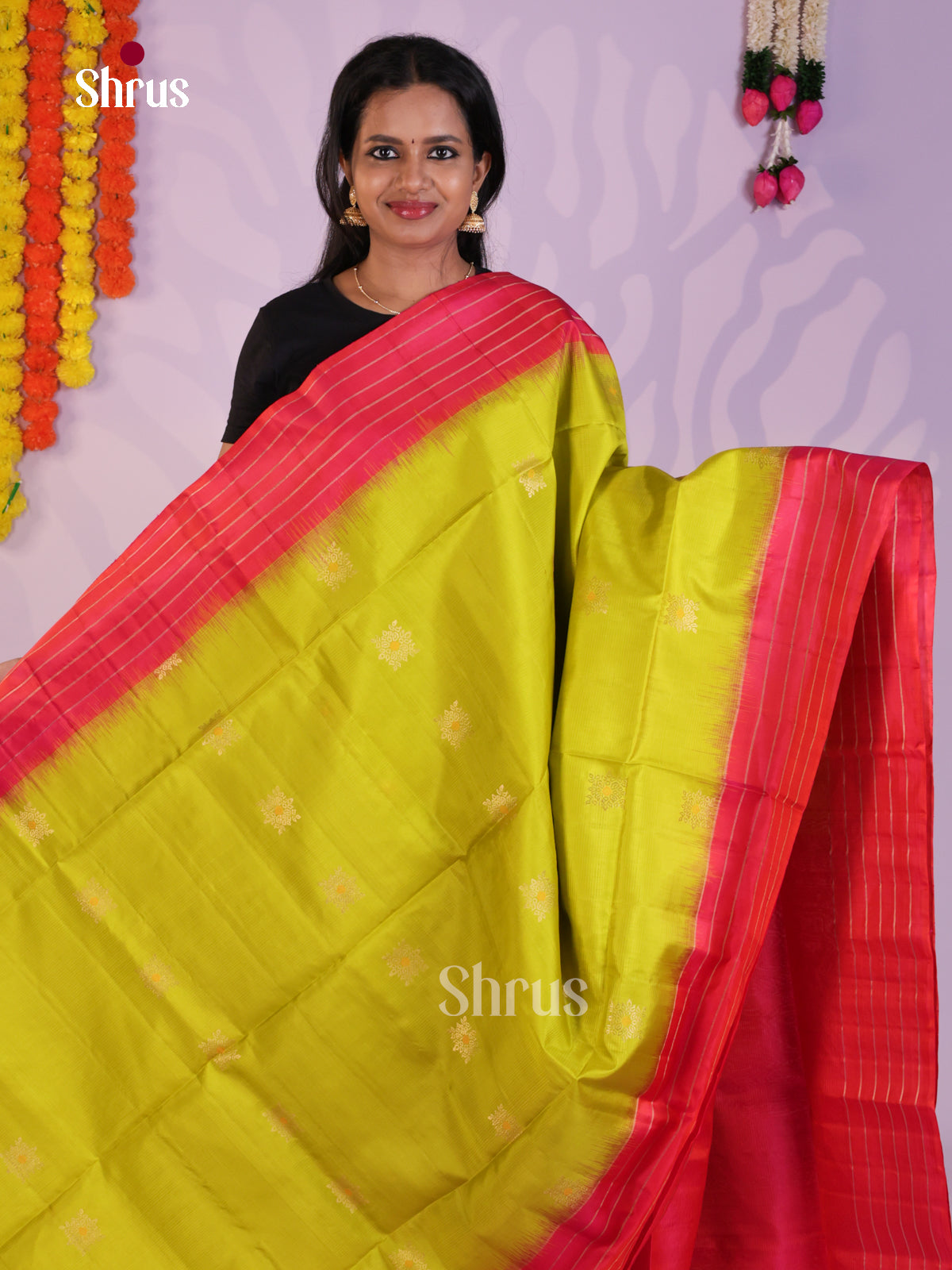 Charming Light Green & Orangish Pink Soft Silk Saree with zari floral buttas