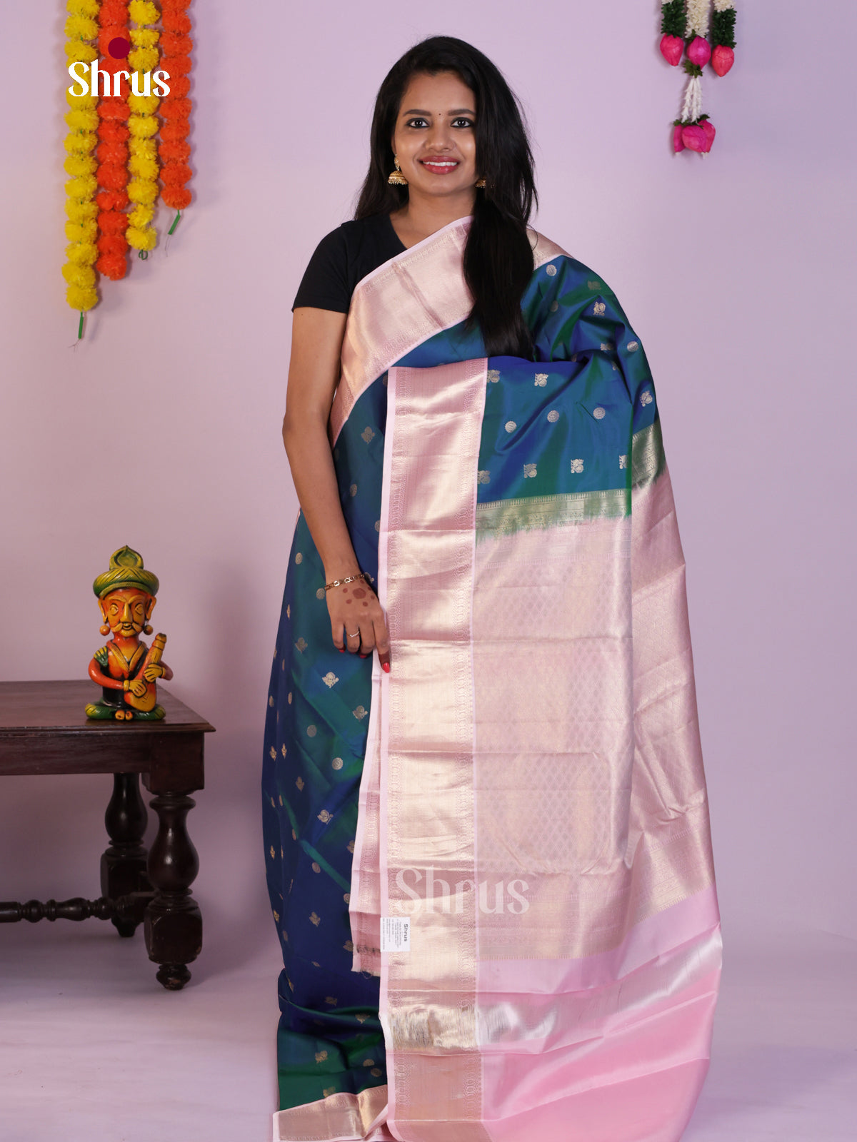 Lustrous Double Shaded Bluish Green Kanjivaram Saree With Baby Pink Zari Border