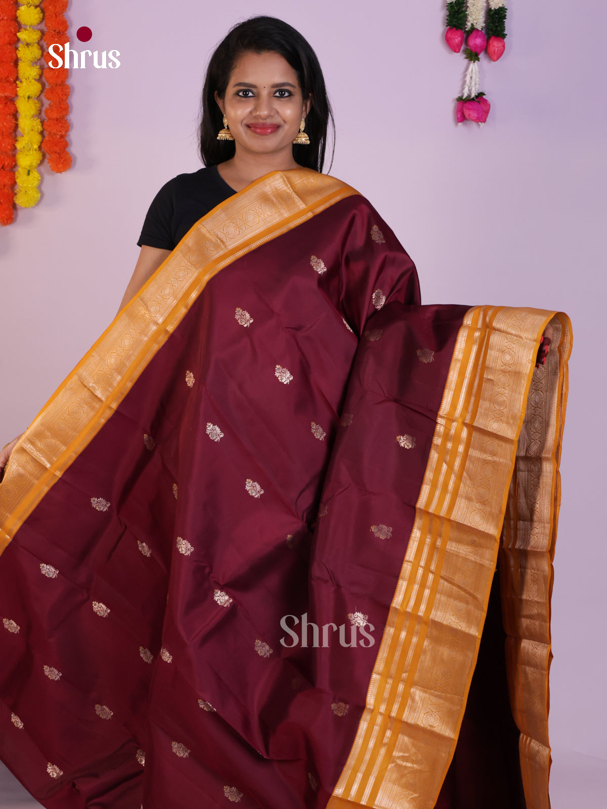 Exquisite Maroon Pattu Saree with Golden Floral Motifs & Mustard Zari Border