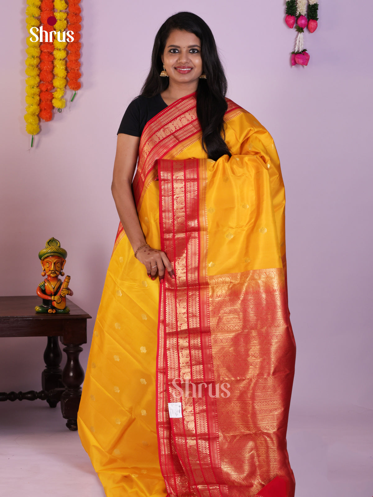 Radiant Yellow Kanjivaram Silk Saree With Red Rettaipet Zari Border