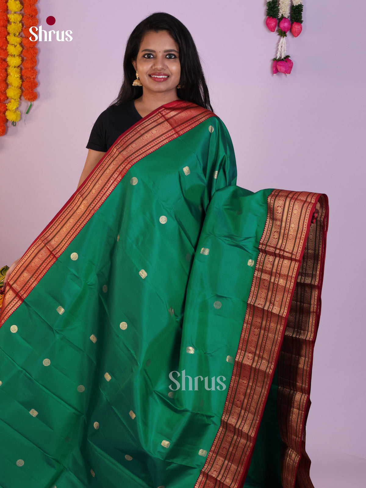 Vibrant Green Wedding Saree with Golden Buttas & Red Brocade Pallu