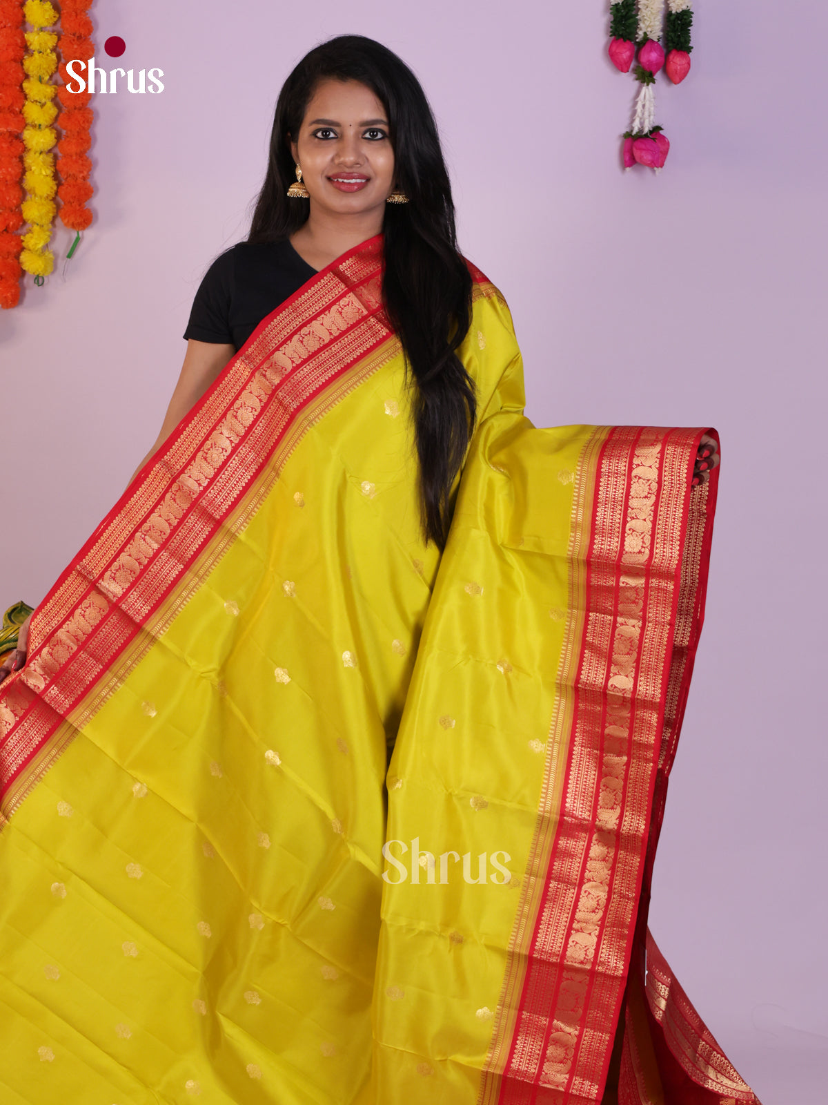 Bright Yellow Kanjivaram Saree With Zari Buttas & Red Brocade Pallu