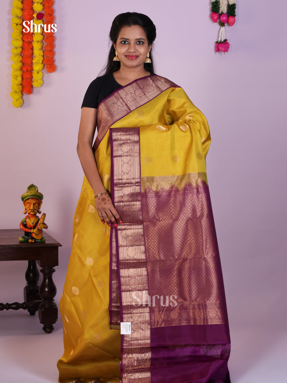 Yellow Kanchipuram Silk Saree With Gold Buttas & Purple Zari Pallu
