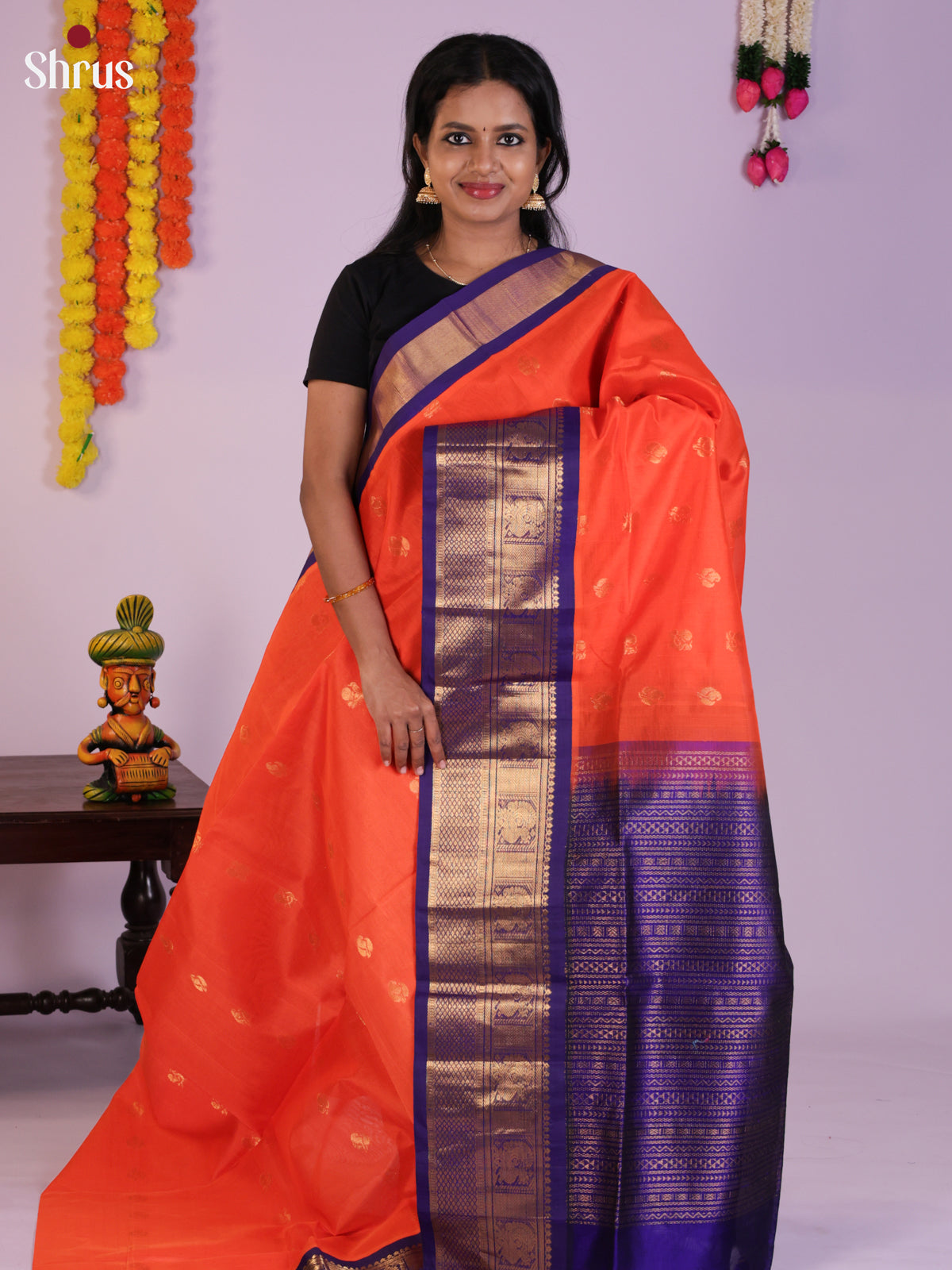 Radiant Orange & Blue Silk Cotton Saree with zari buttas & Splendid border - DLS29002