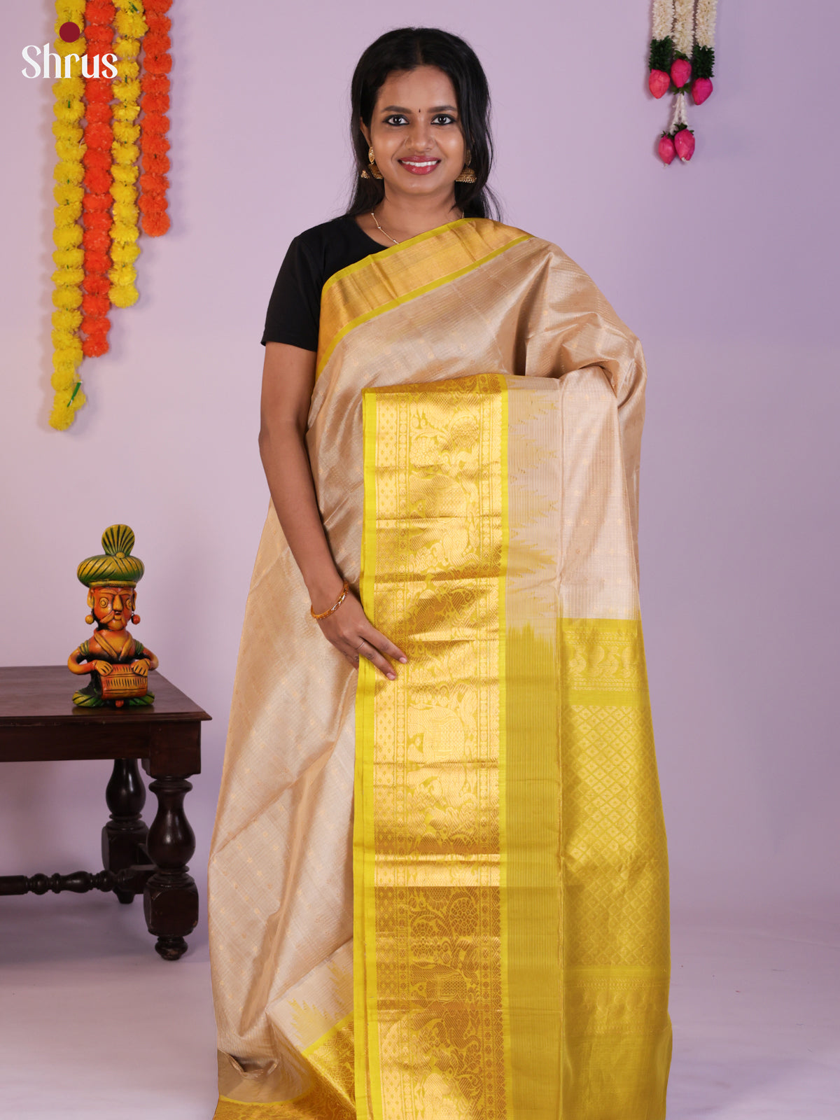 Charming Cream & Light Green SilK Cotton Saree with zari checks , buttas & Zari border -DLS29014