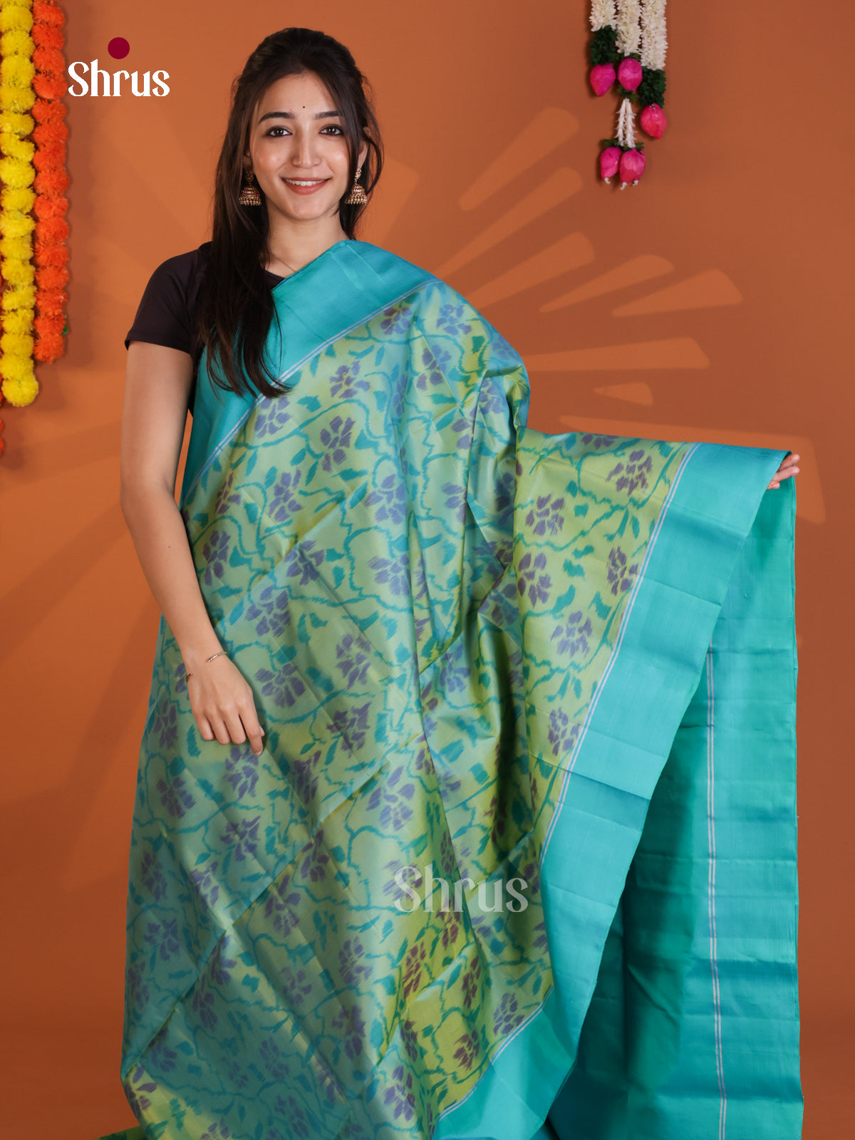 Charming Green & Blue Soft Silk Saree with ikkat floral pattern & brocade pallu