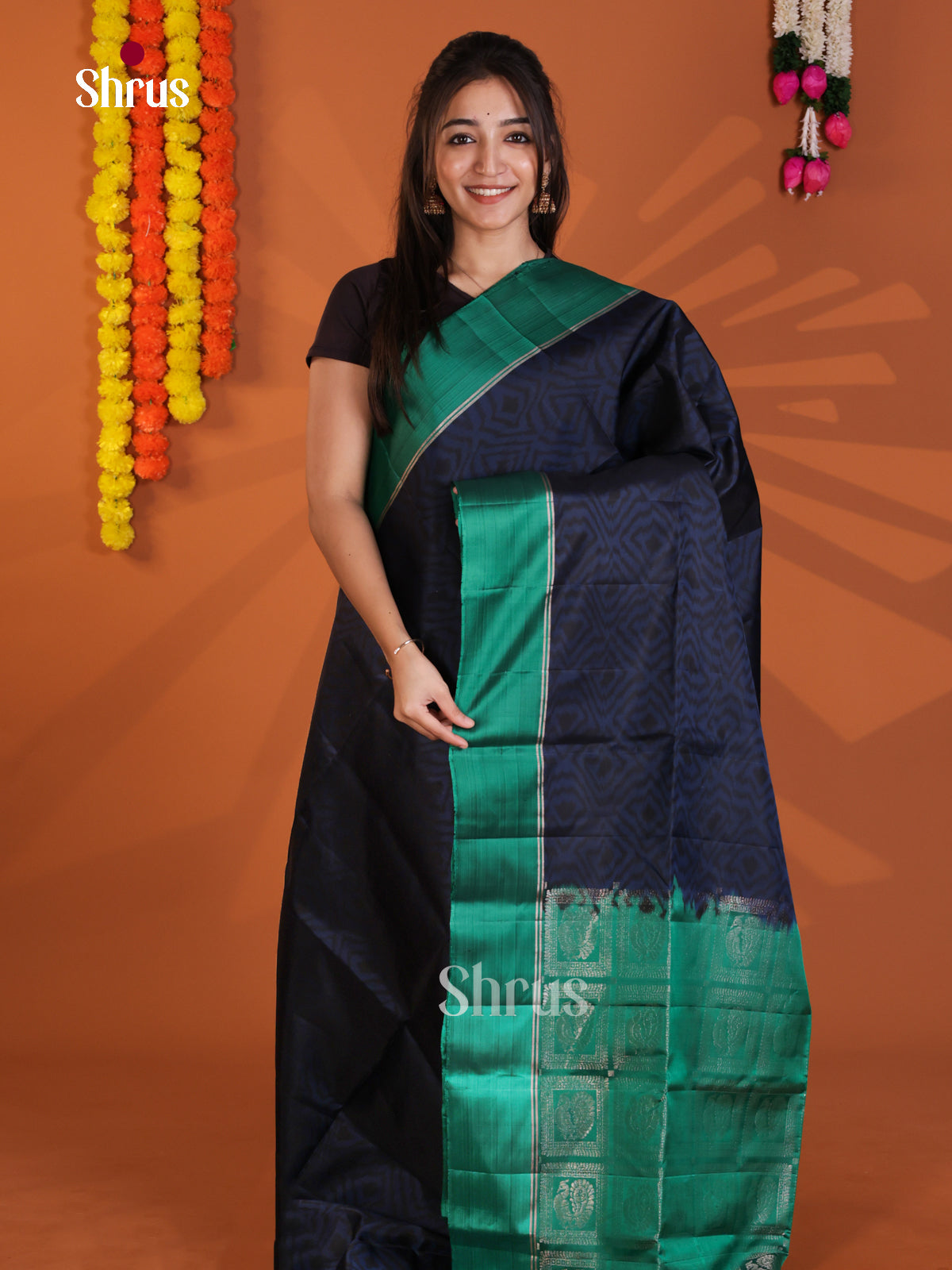 Vibrant Blue & Green Soft Silk Saree with ikkat pattern & Brocade pallu