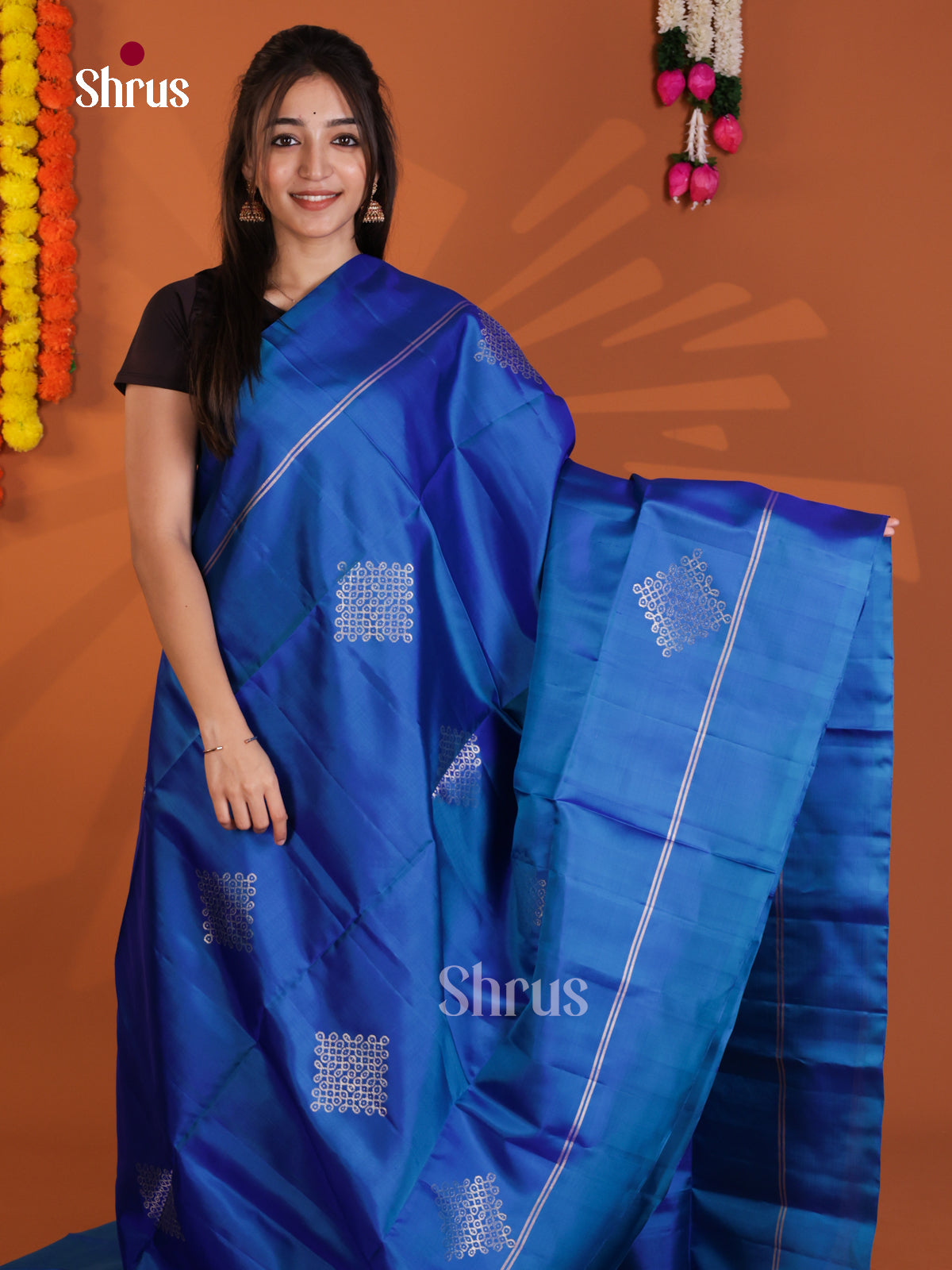 Vibrant Blue Soft Silk Saree with zari kolam motifs - Shop on Shrus.com