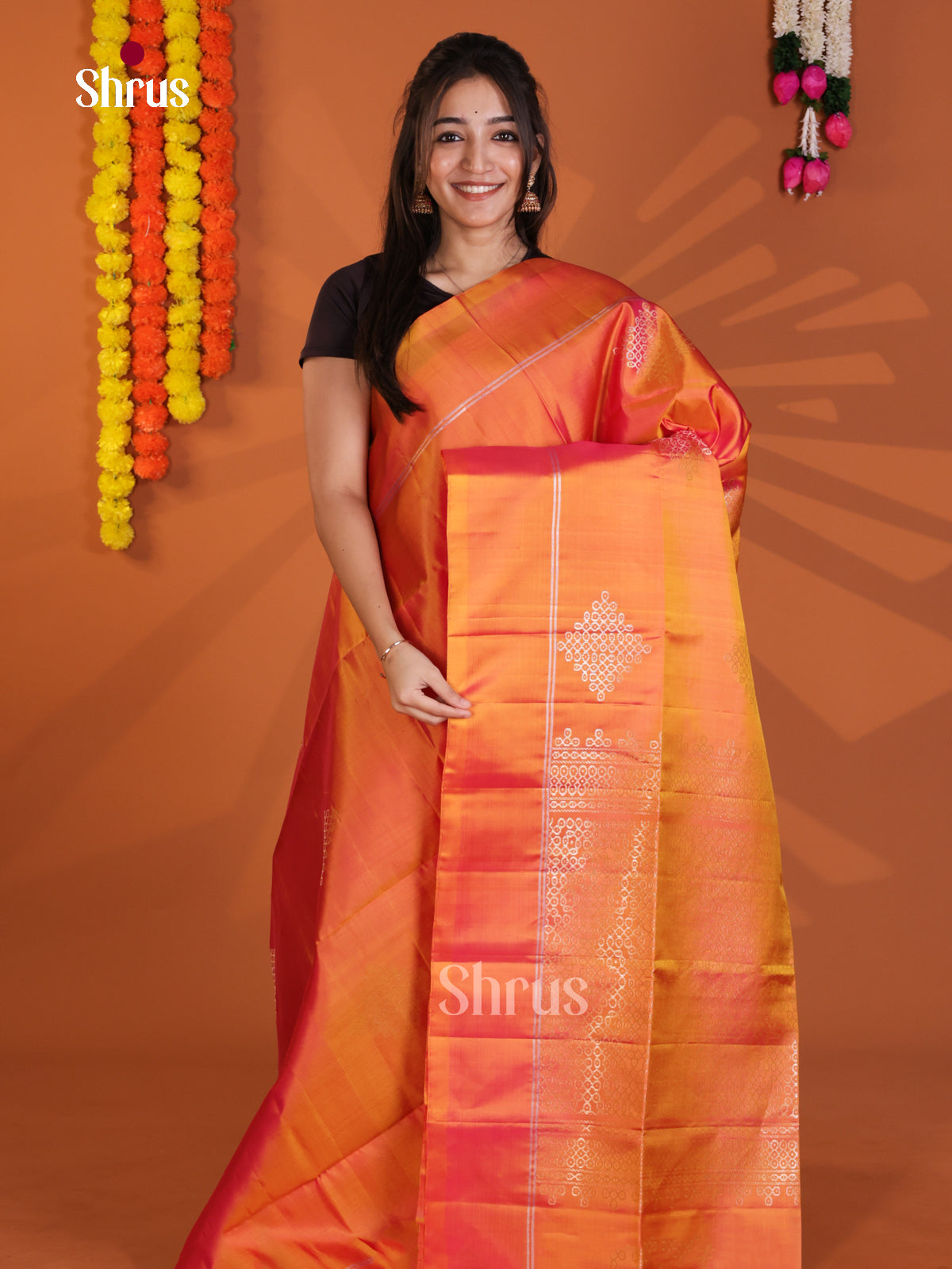 Luminous Orange Single Tone Soft Silk Saree with zari kolam motifs - Shop on Shrus.com