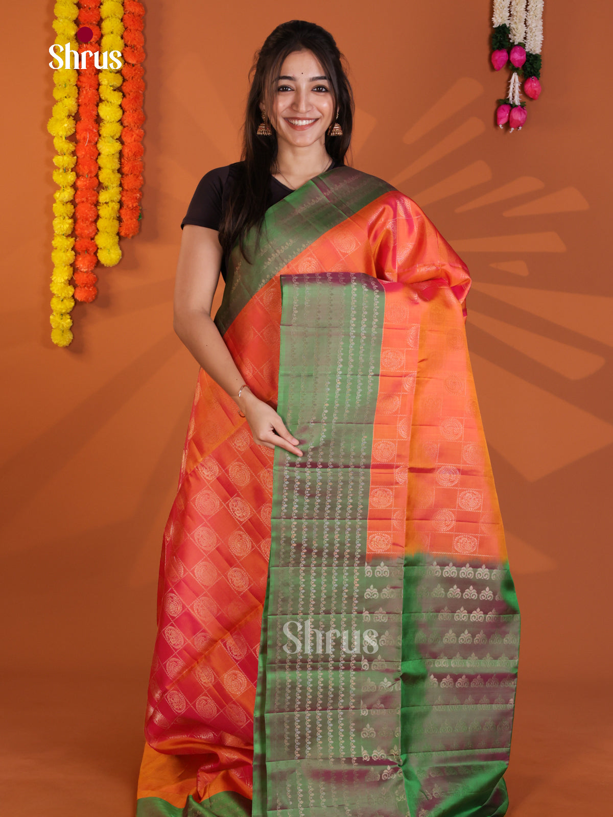 Lustrous Orange & Green Soft Silk Saree with zari checks & peacock in round motifs