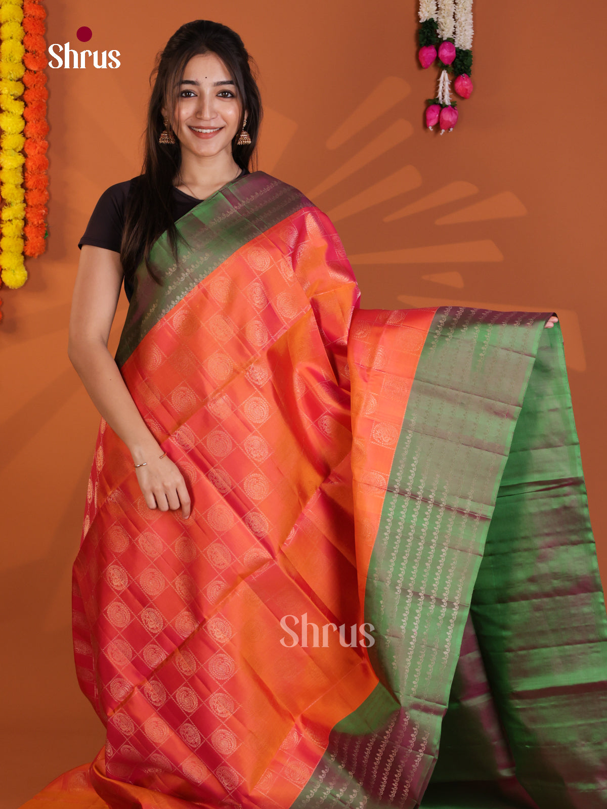 Lustrous Orange & Green Soft Silk Saree with zari checks & peacock in round motifs