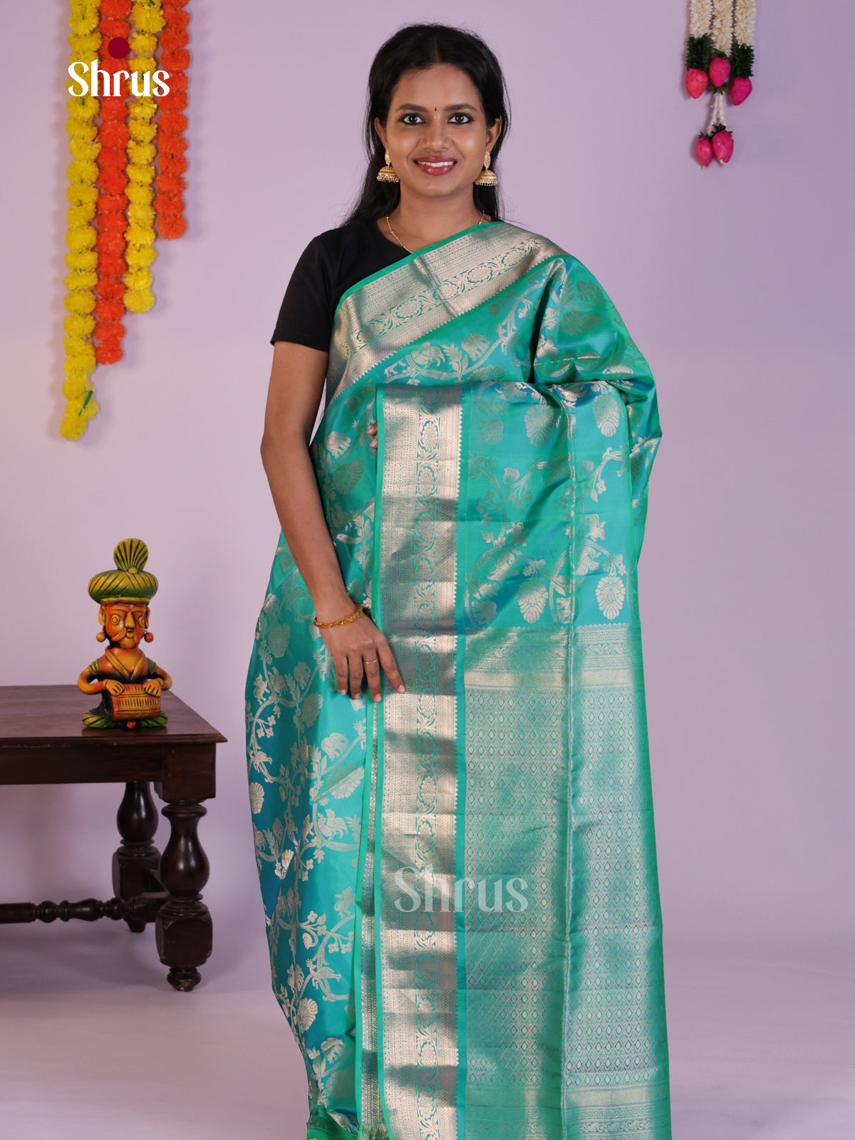 Radiant Teal Soft Silk Saree with zari vanashingaram floral nestling brocade