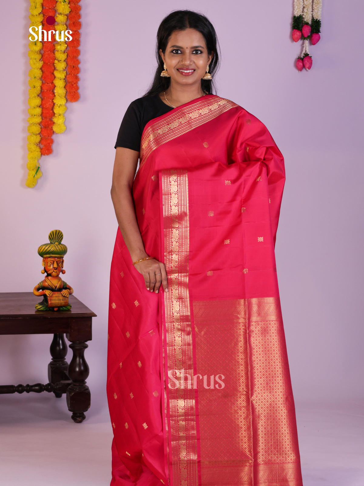 Charming Pink single Tone Soft Silk Saree with zari peacock buttas & rich border