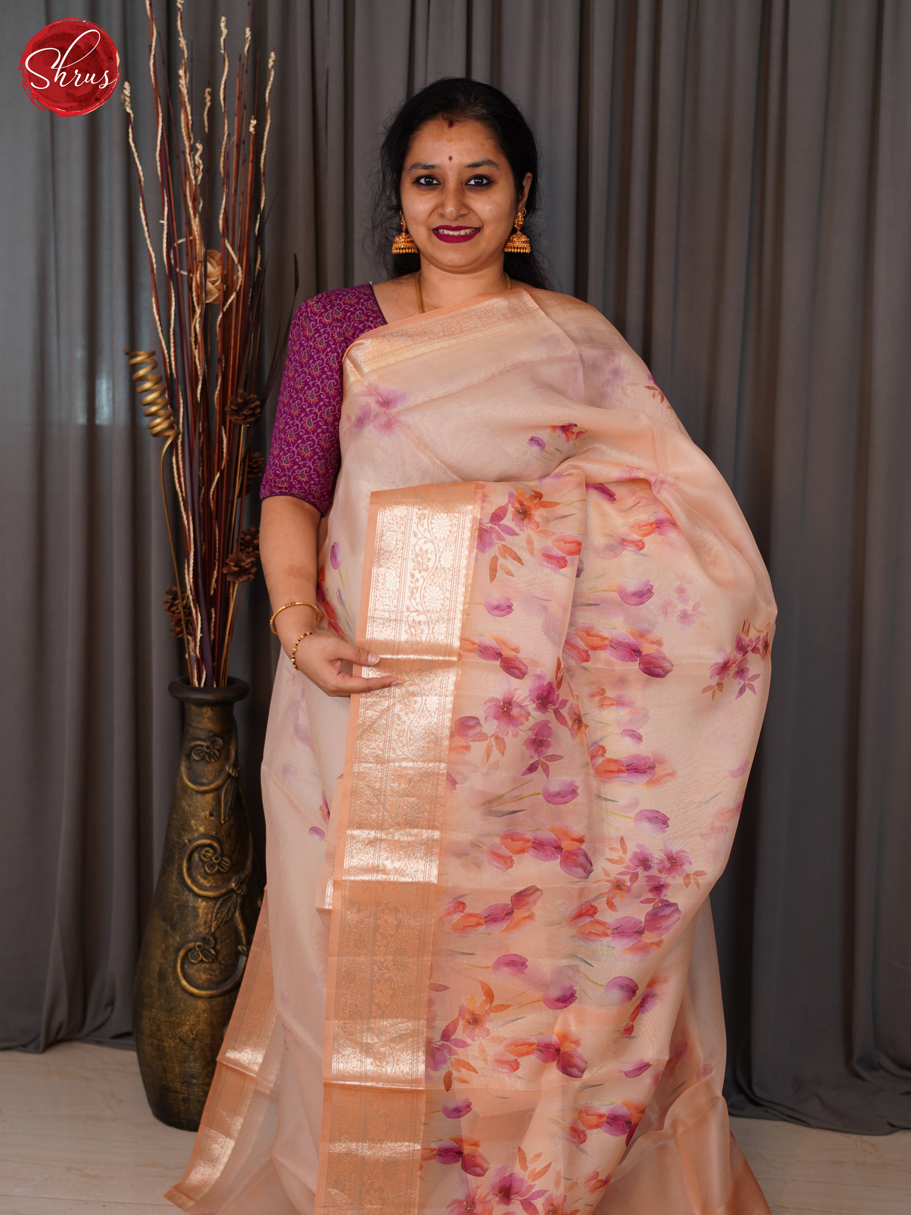 Light Peach(Single Tone)- Organza with floral print on the body and zari border - Shop on ShrusEternity.com