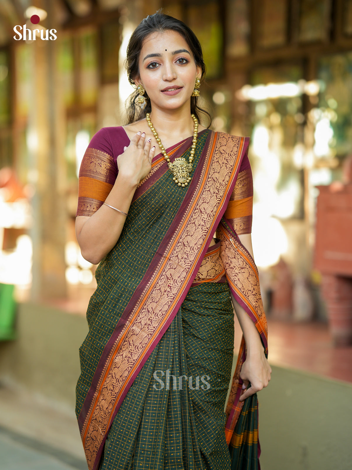 Pretty Dark Green Chettinad Cotton Saree With Intricate Checks, Buttas & Maroon Zari Border