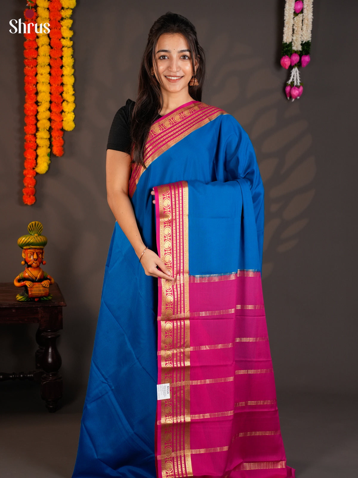 Vibrant Blue Mysore Silk Saree with zari striped Pink border -EAS09196