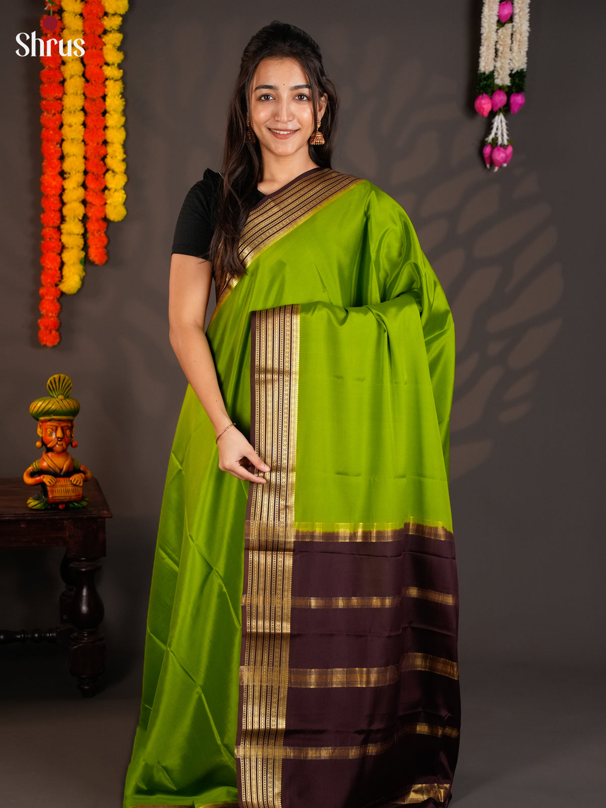 Serene Parrot Green & Brown Mysore Silk Saree with zari striped border -EAS09236