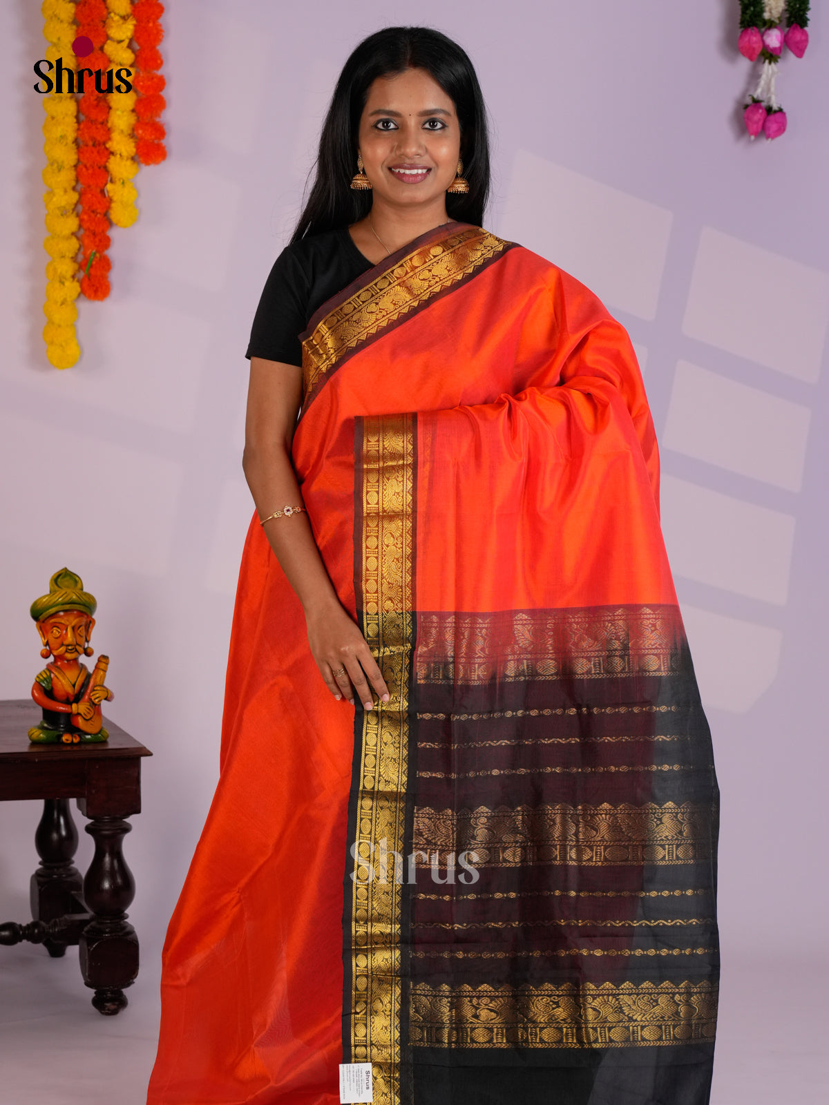 Lustrous Orange Plain Cotton Silk Saree with Brown Zari Woven Border
