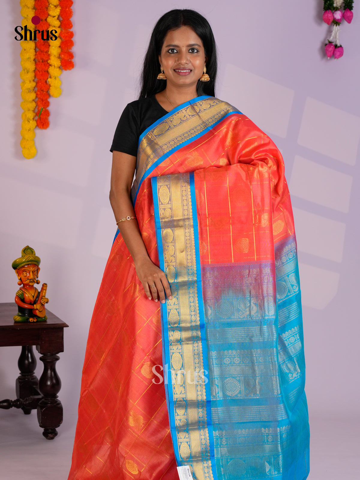 Radiant Orange & Blue Silk Cotton Saree with zari checks & peacock buttas - EAS13399