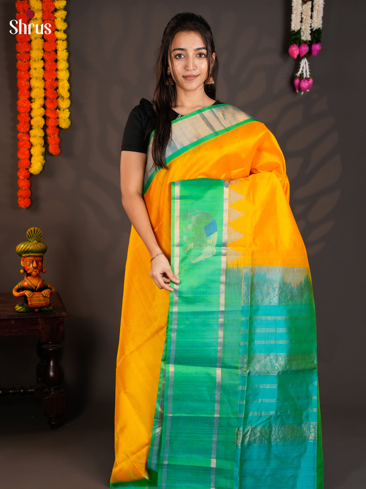 Glorious Yellow & Teal Green Silk Cotton with zari elephant motifs border - EAS19019
