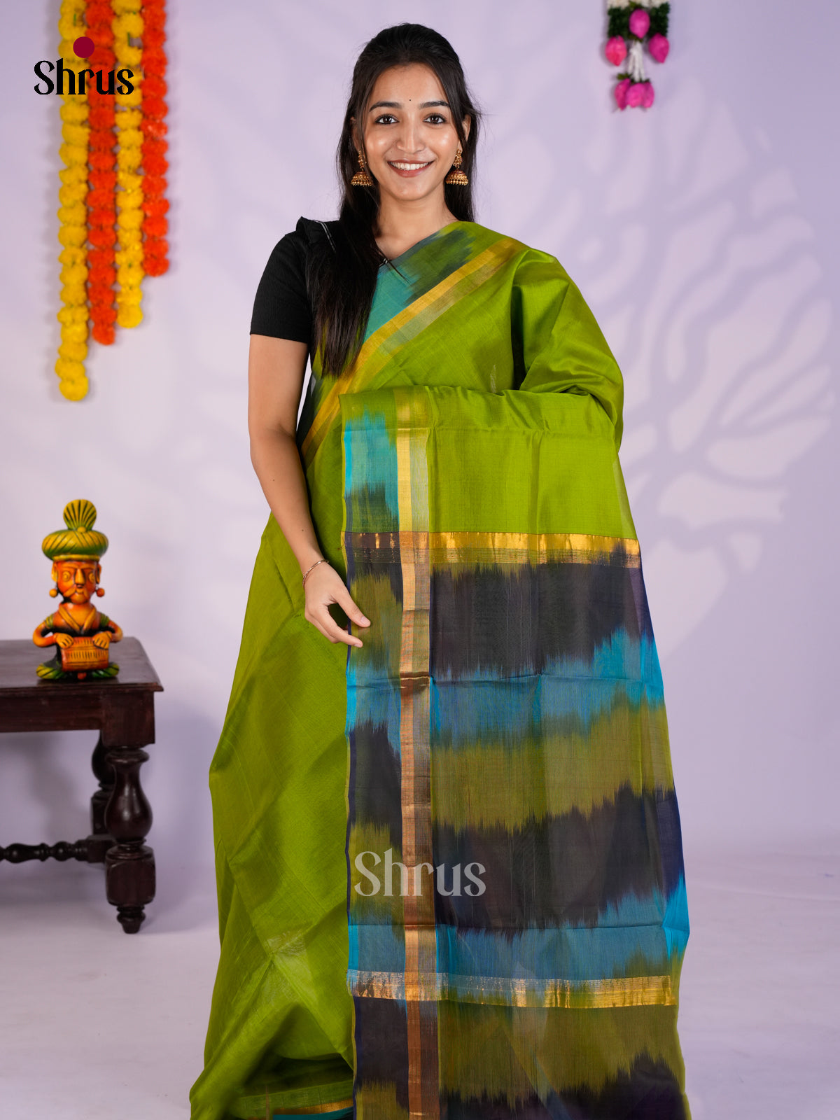 Buy Beautiful Lime Green Cotton Silk Saree Online with Plain Body & Black Ikkat Patterned Pallu